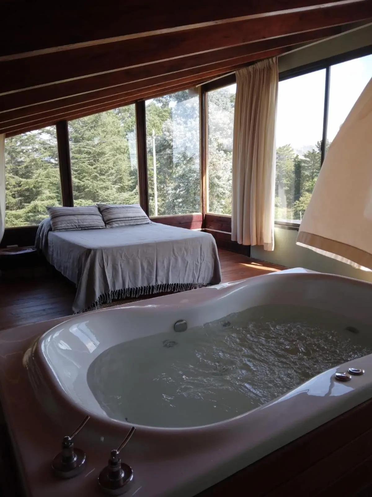 Bed in La Azotea cabañas & suites