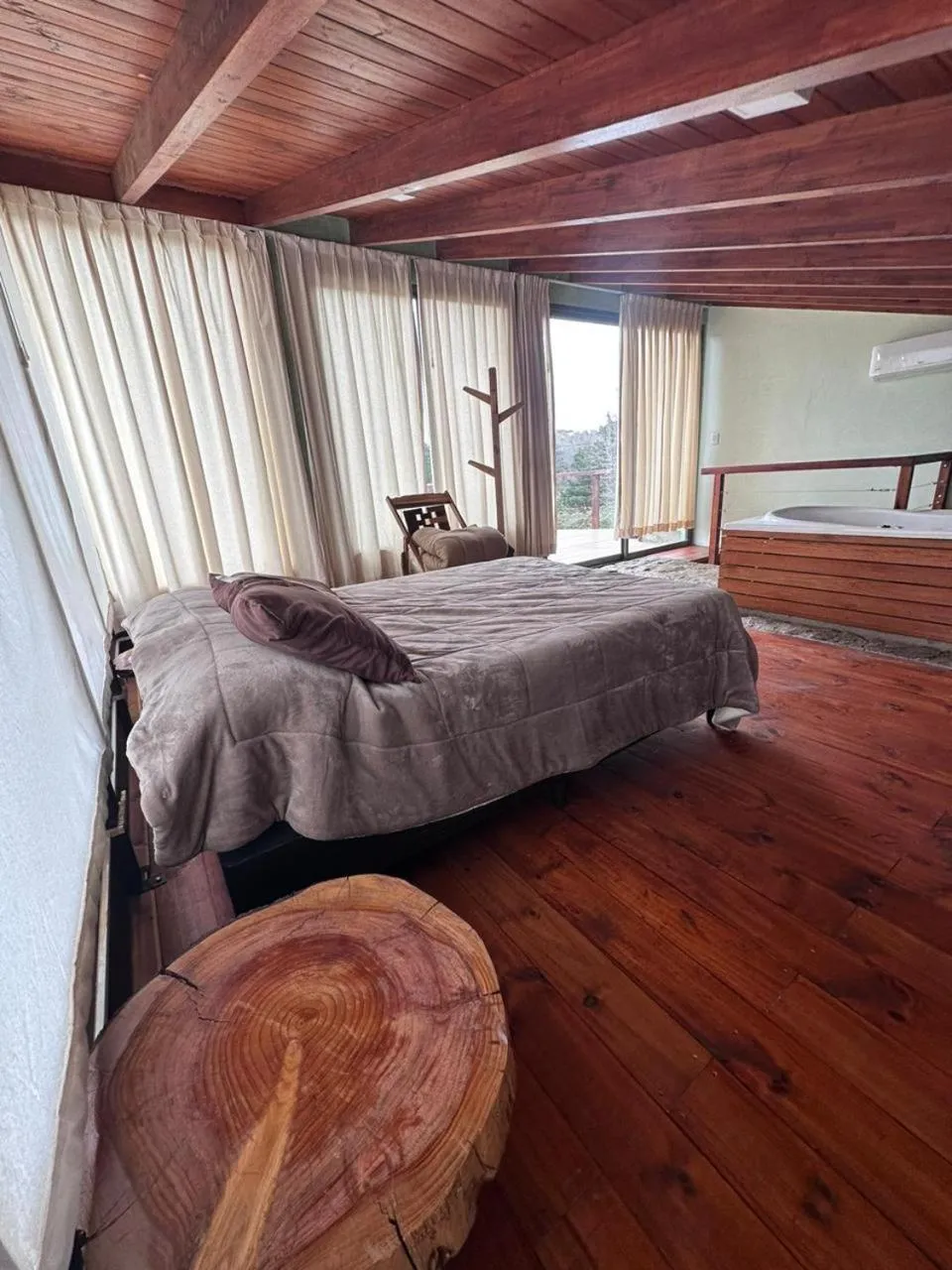 Bed in La Azotea cabañas & suites