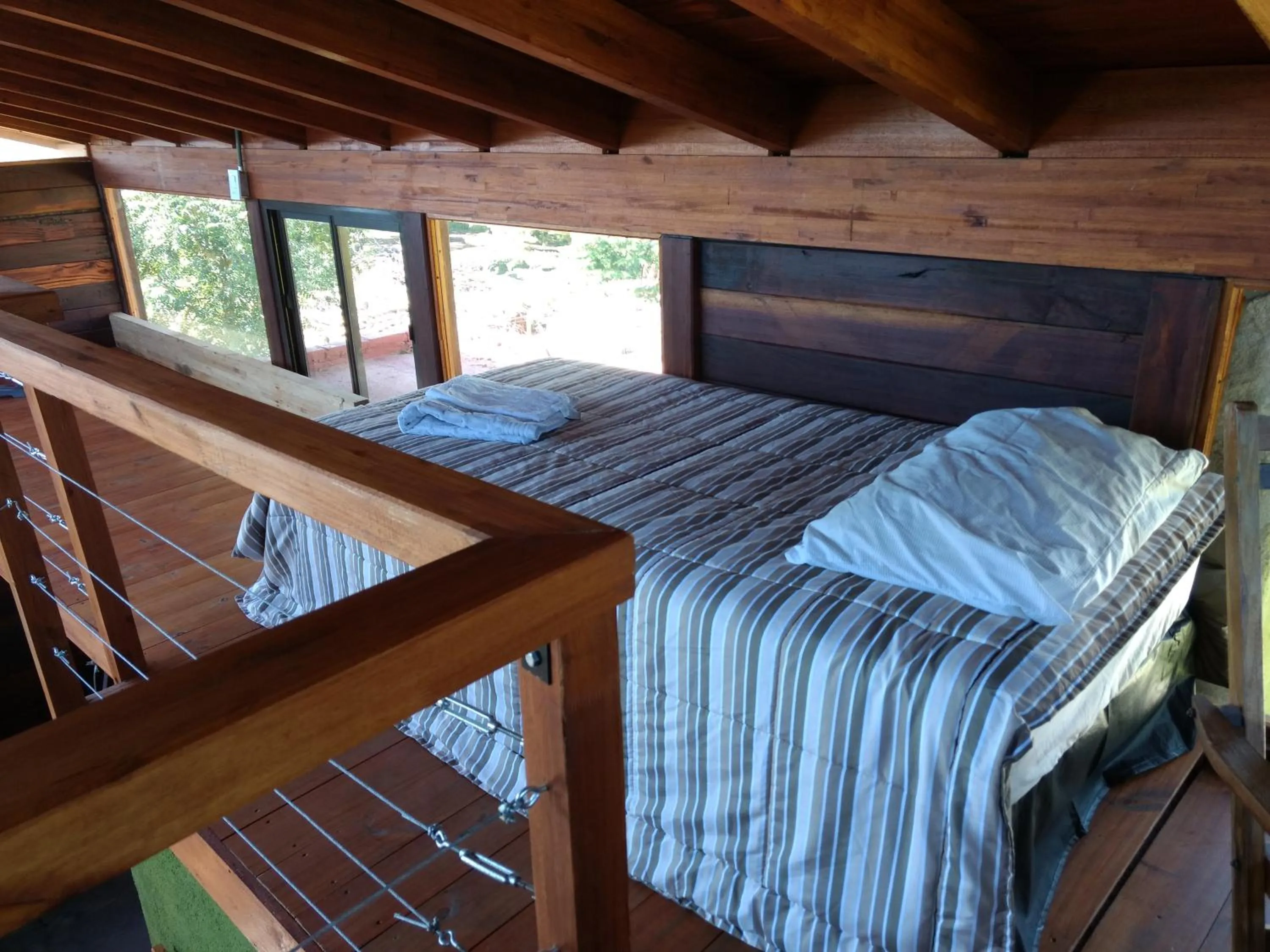 Bed in La Azotea cabañas & suites