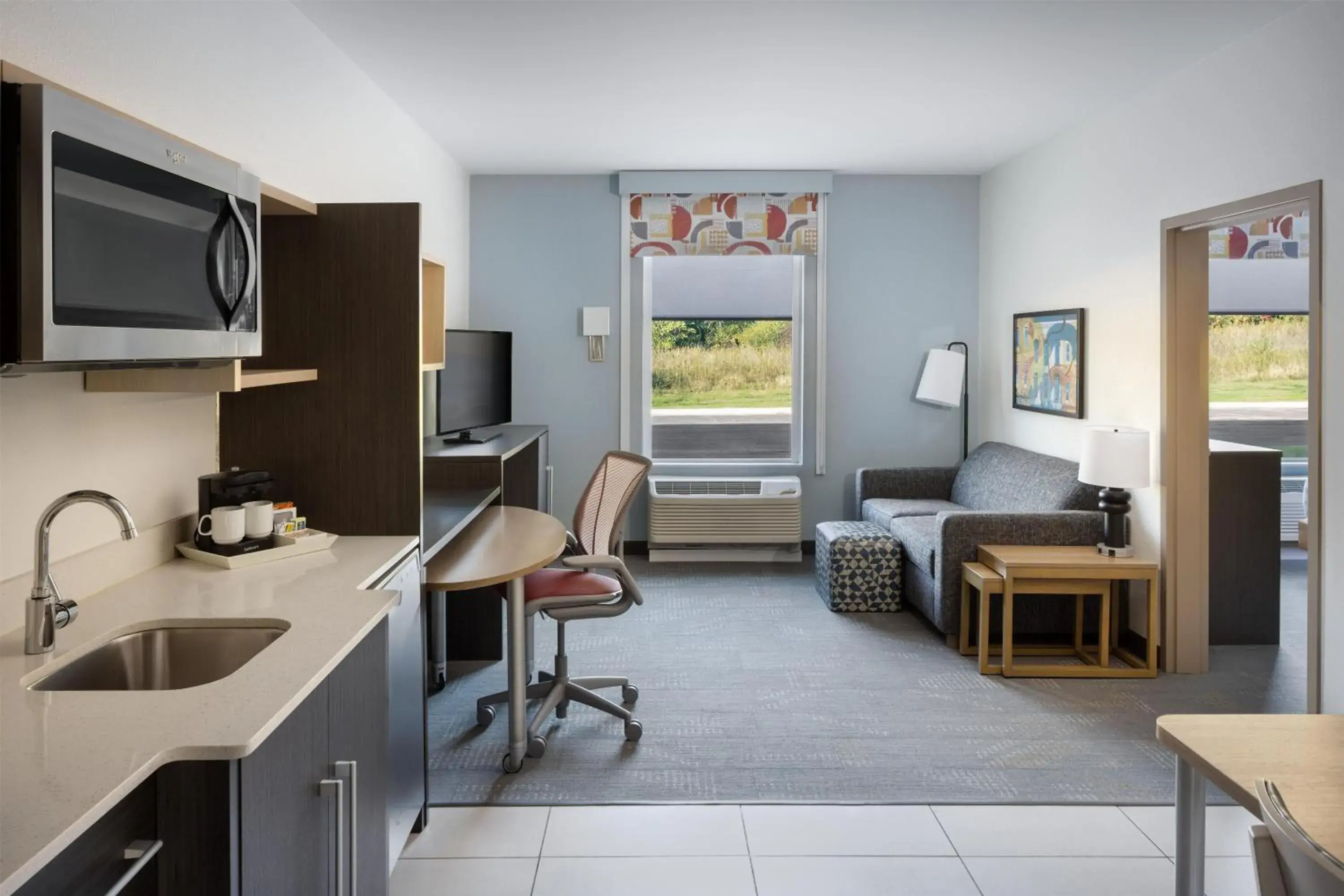 Living room in Home 2 Suites By Hilton Jackson Living room in Home 2 Suites By Hilton Jackson