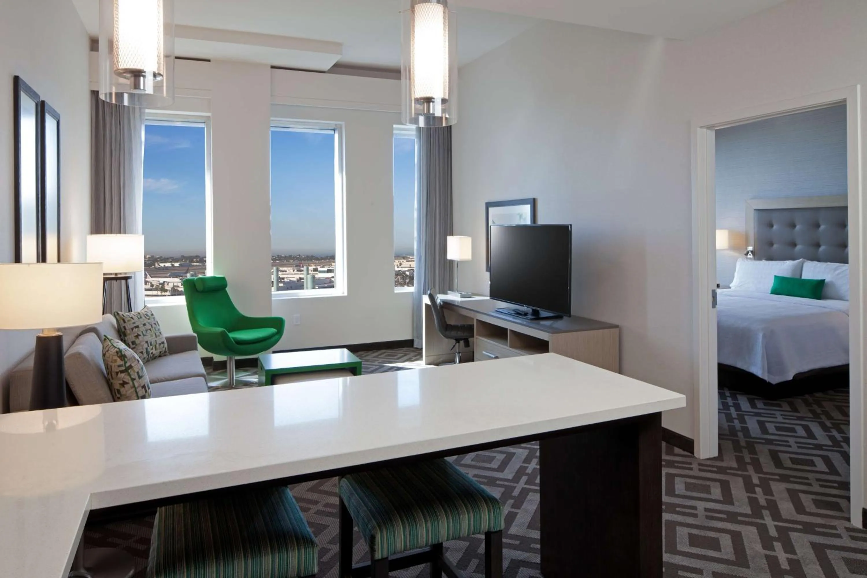 Living room, Bed in Homewood Suites By Hilton Los Angeles International Airport