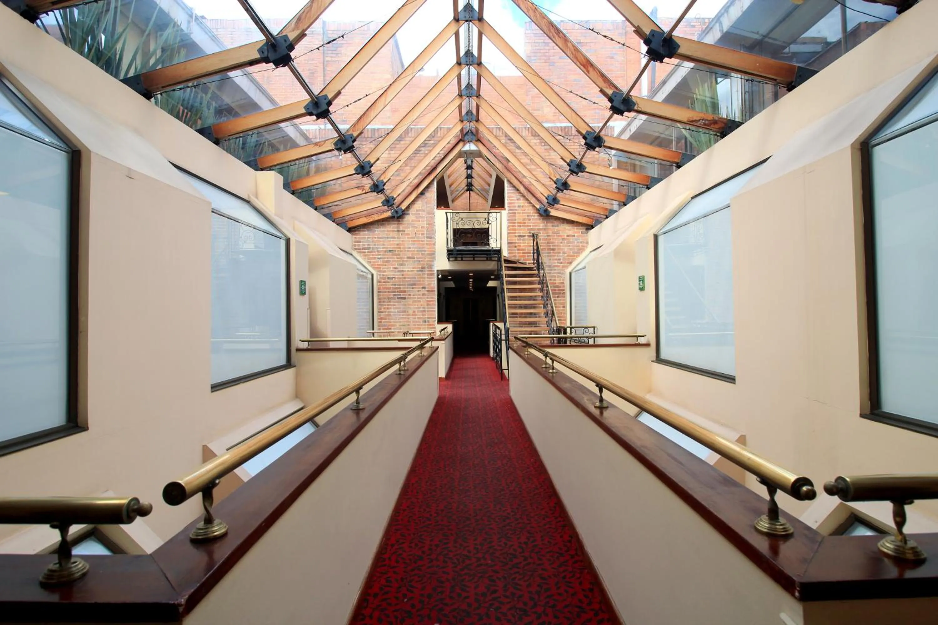 Area and facilities in Hotel Windsor House Inn By GEH Suites