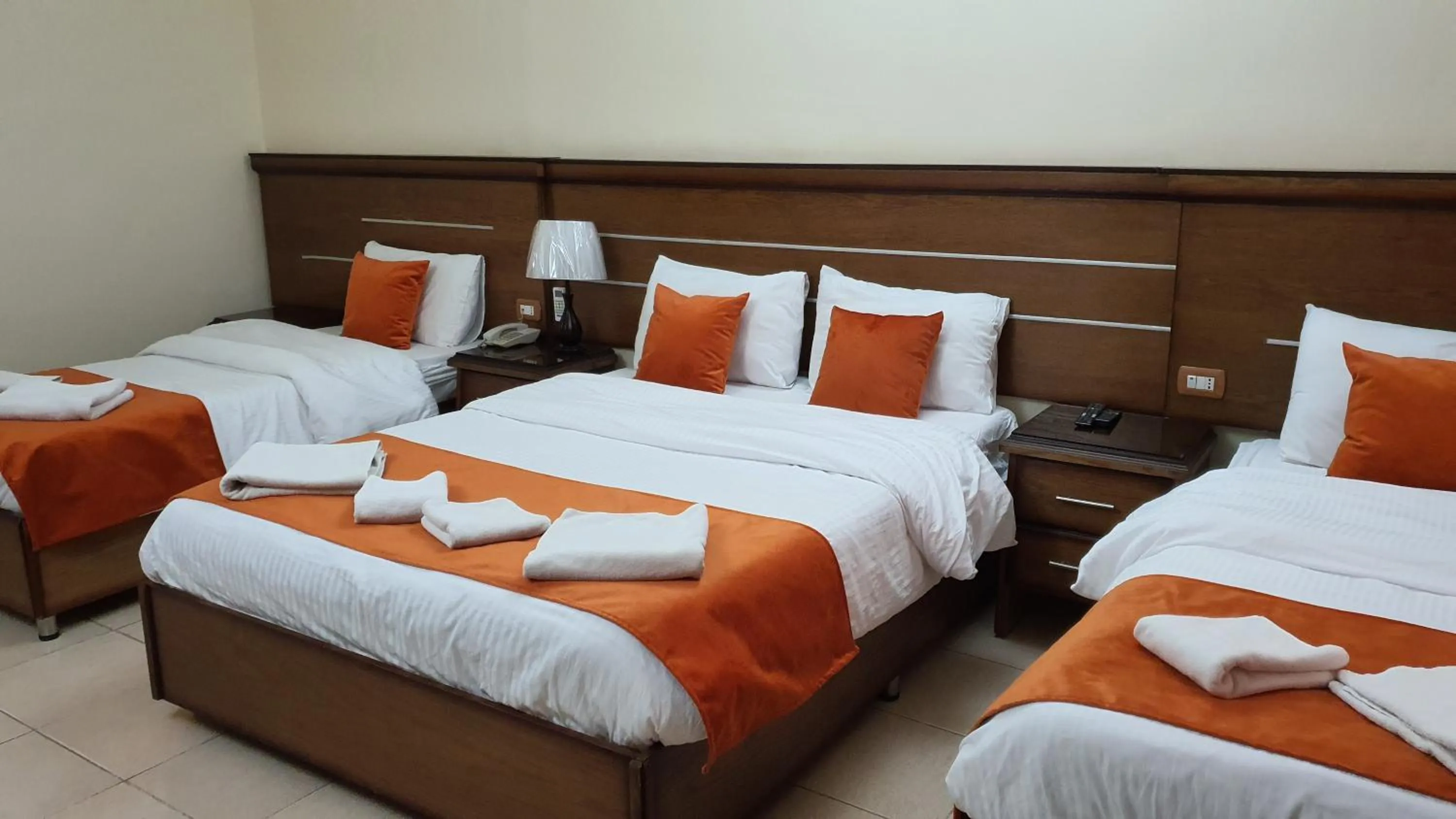 Bed in Sunset Hotel