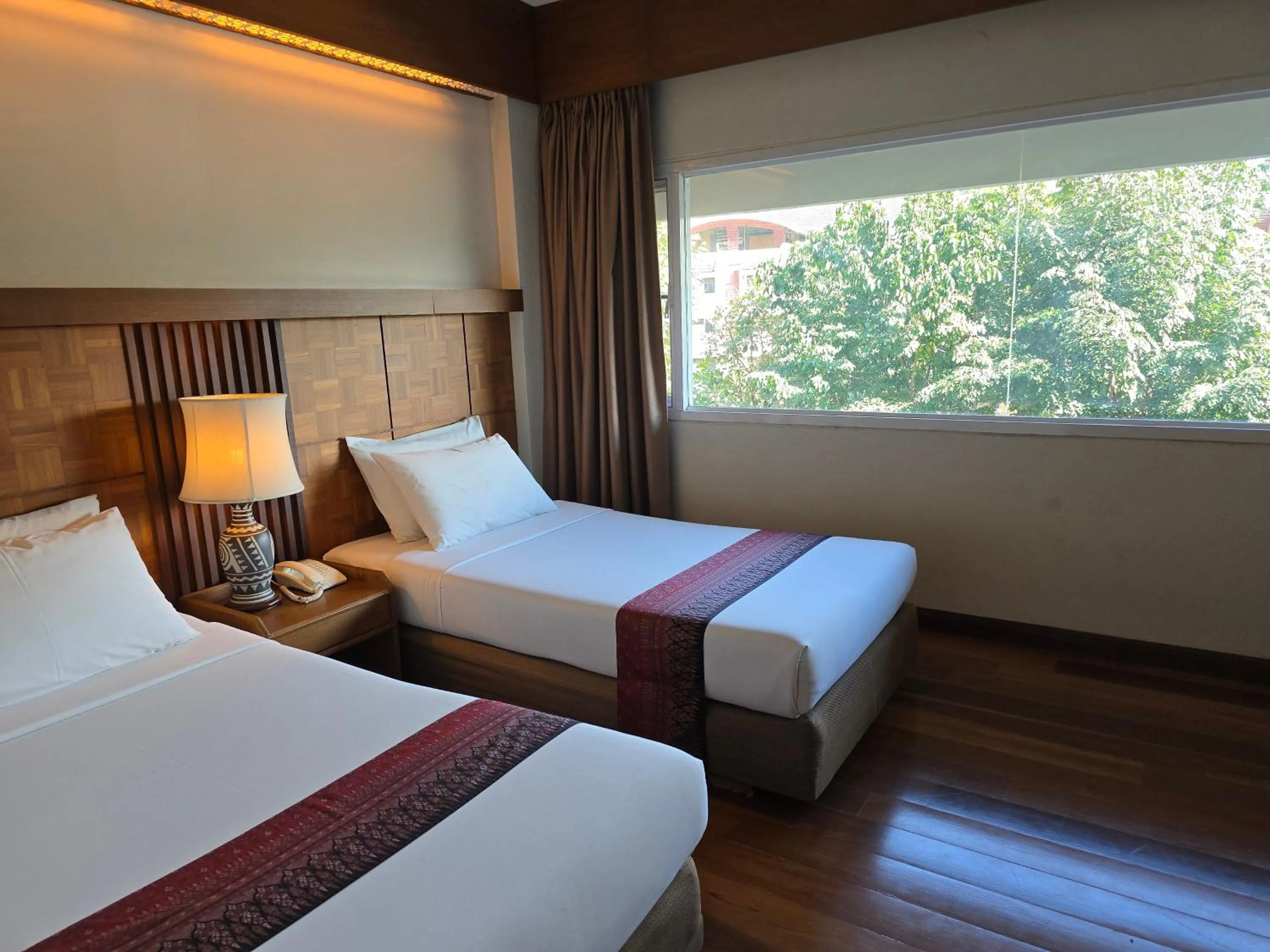 Bed in Chiang Mai Phucome Hotel