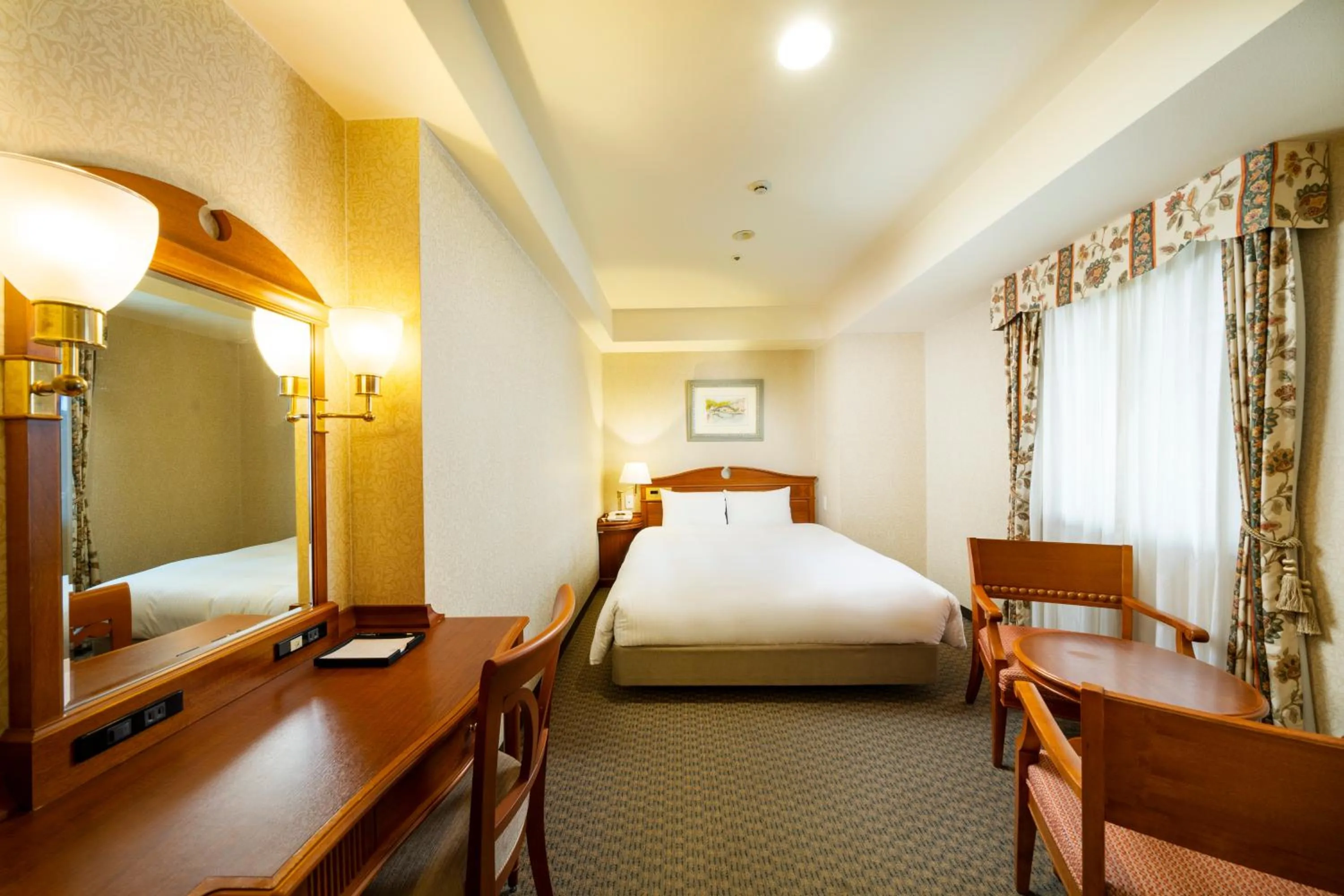 Bed in KOKO HOTEL Nagoya Sakae