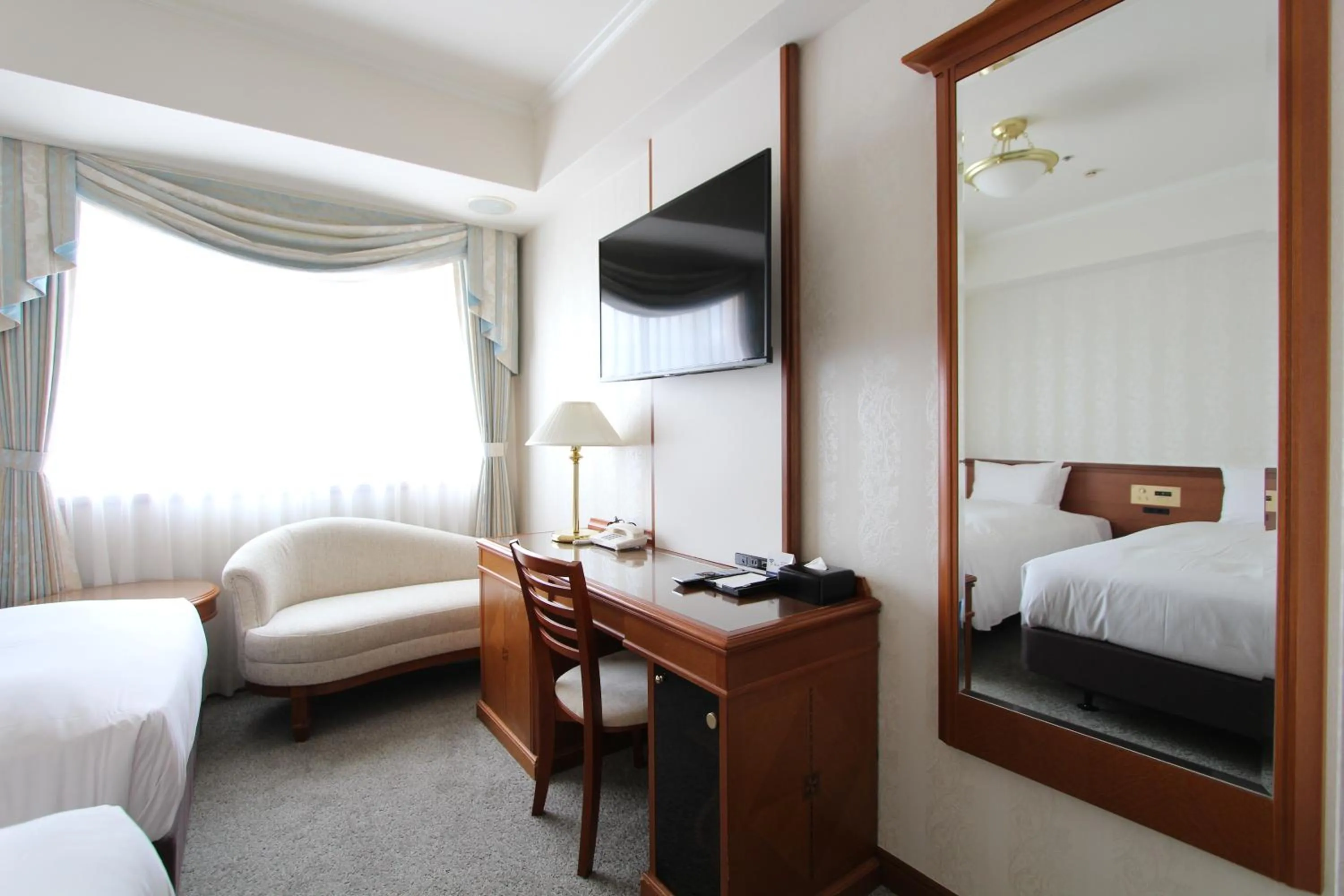 Photo of the whole room, Bed in KOKO HOTEL Osaka Shinsaibashi