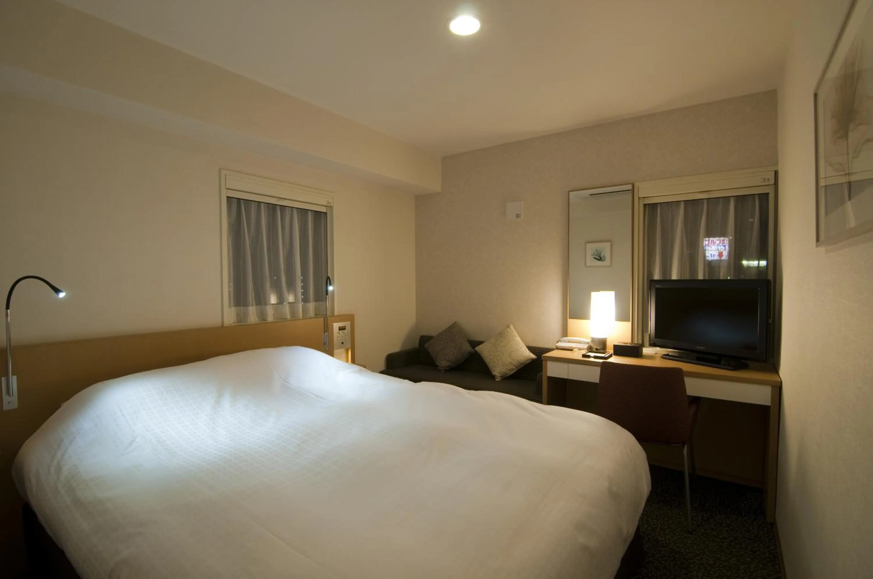 Bed in Hotel Sunflex Kagoshima