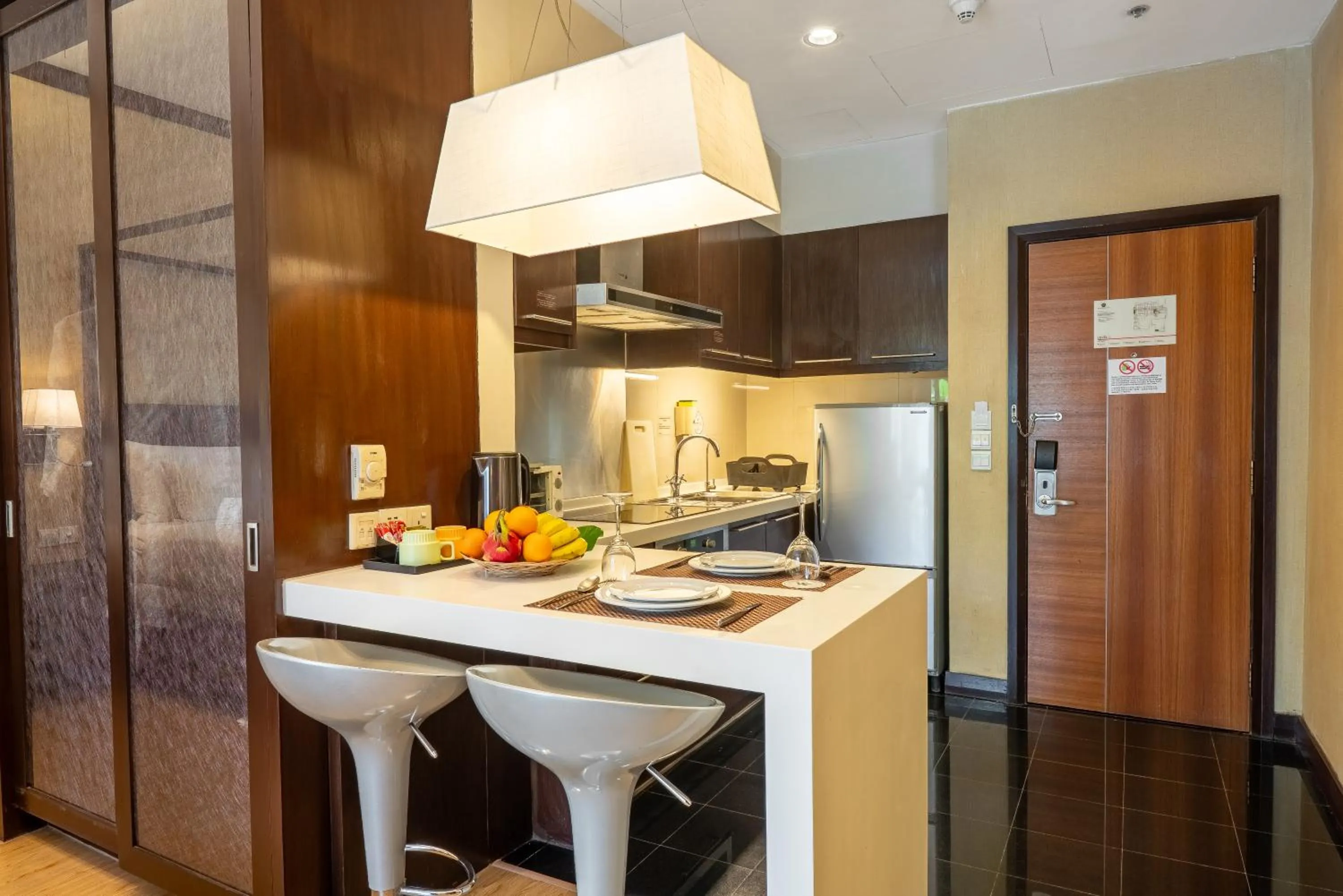 Kitchen or kitchenette in Micasa All Suites Hotel