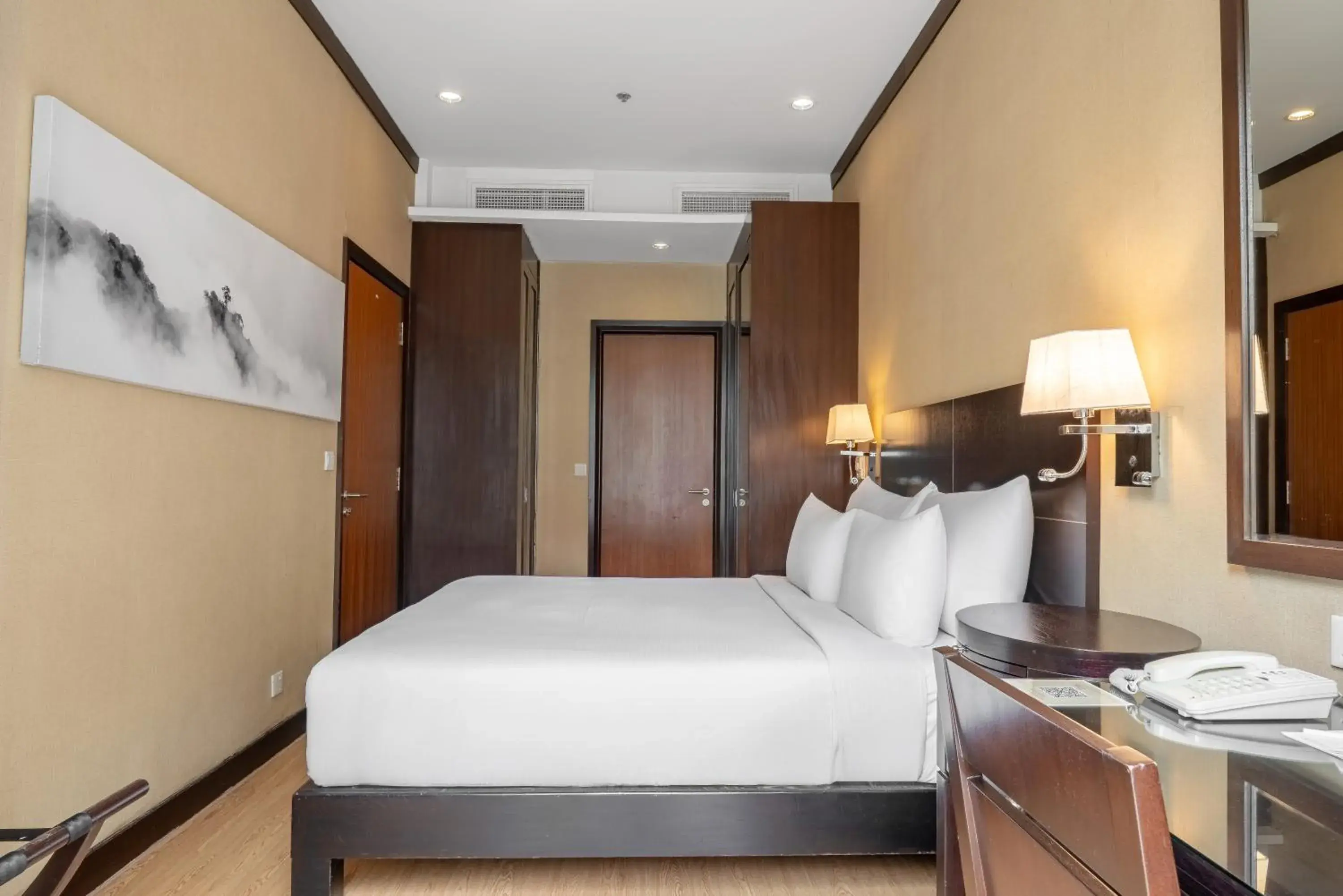 Bed in Micasa All Suites Hotel Bed in Micasa All Suites Hotel