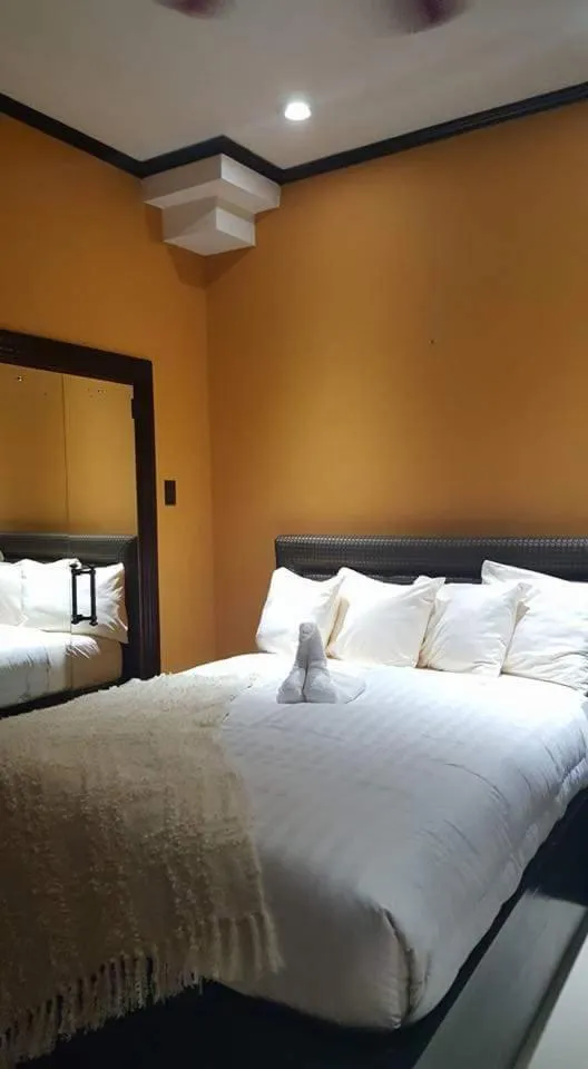 Bed in Villa Dora Mae