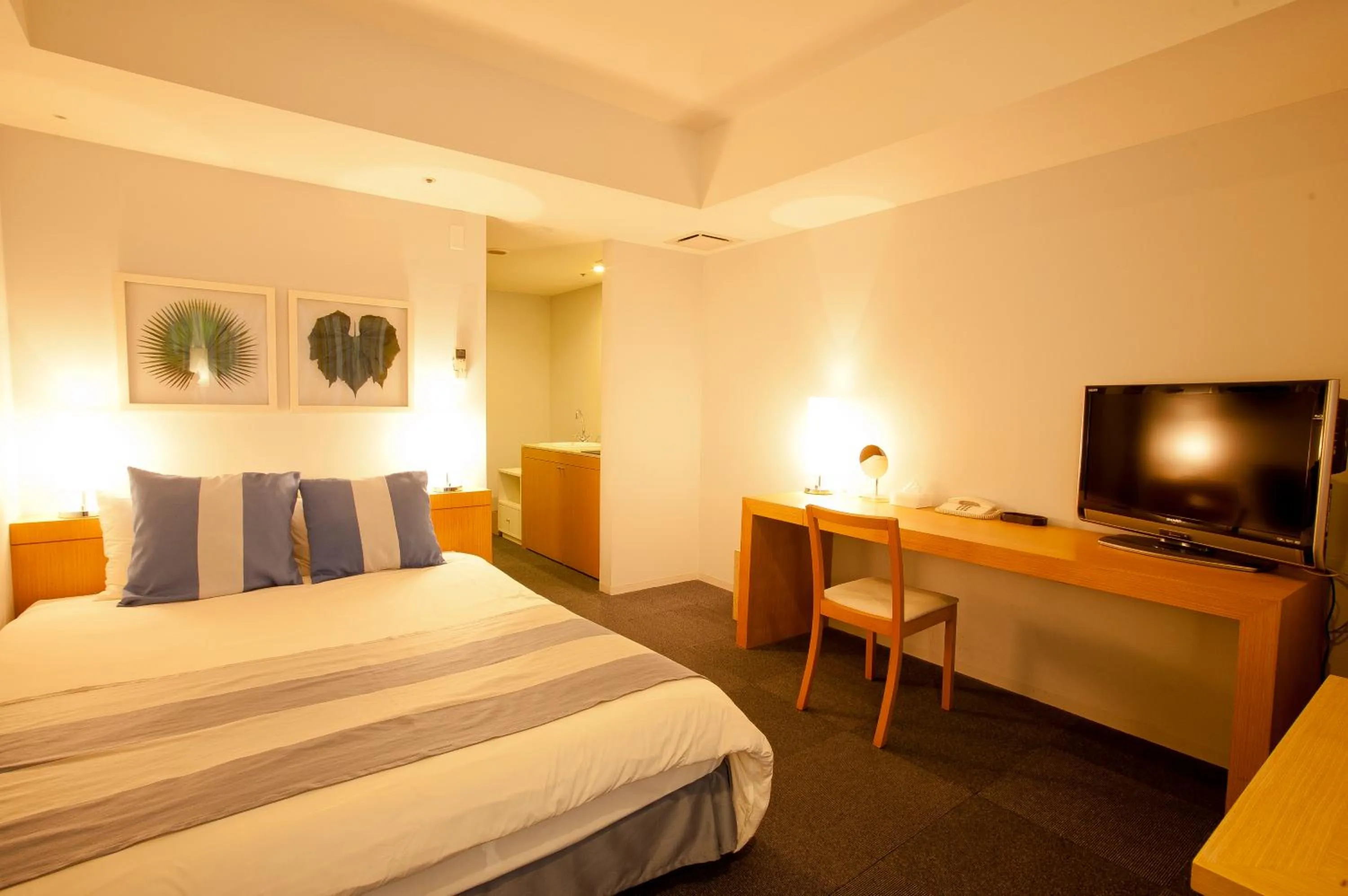 Photo of the whole room, Bed in The Beach Tower Okinawa