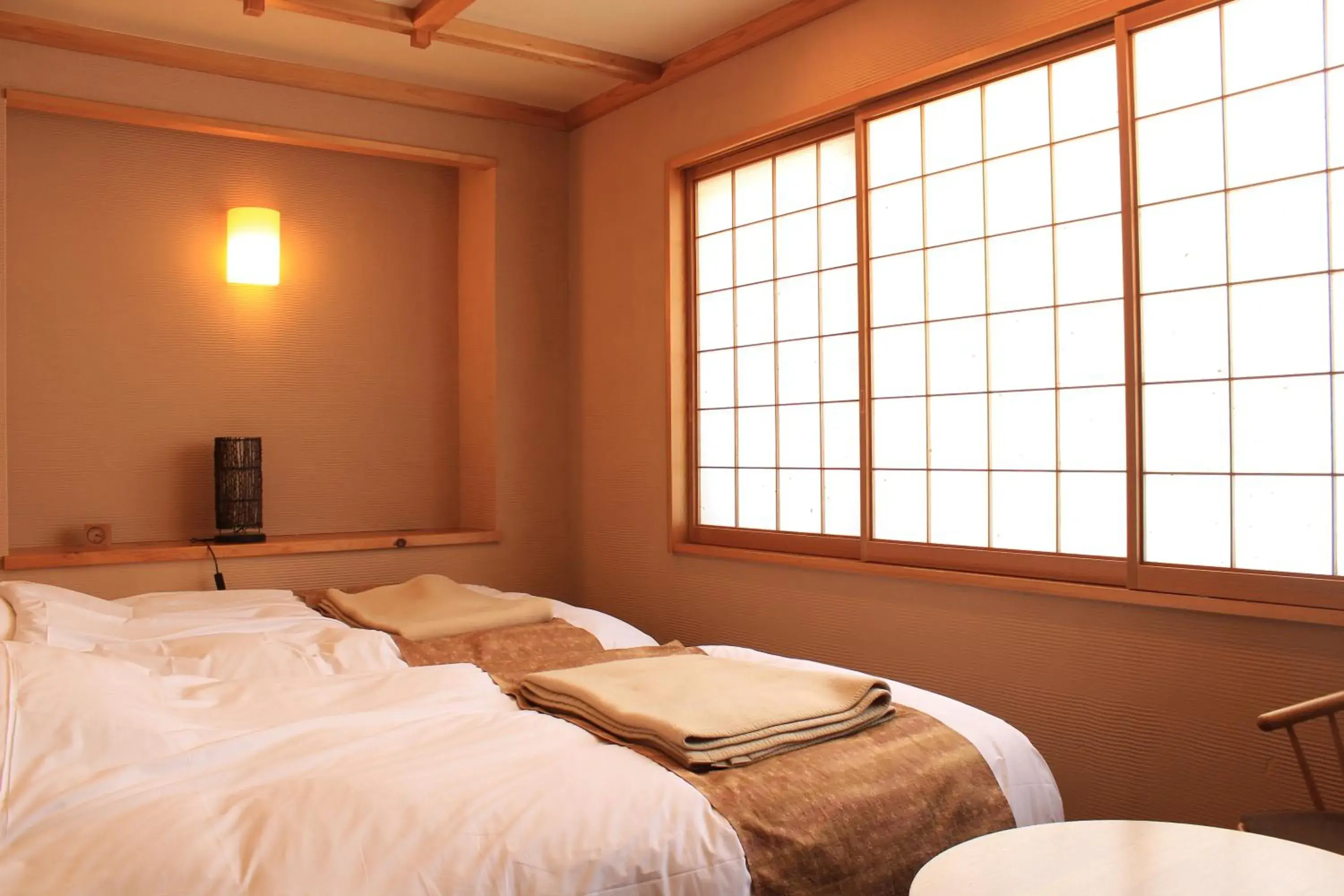 Bed in Miyama Ouan Kyoritsu Resort Bed in Miyama Ouan Kyoritsu Resort