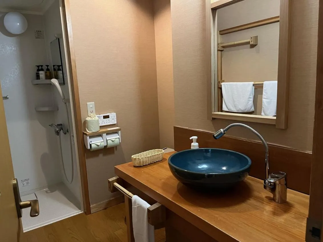 Shower in Miyama Ouan Kyoritsu Resort