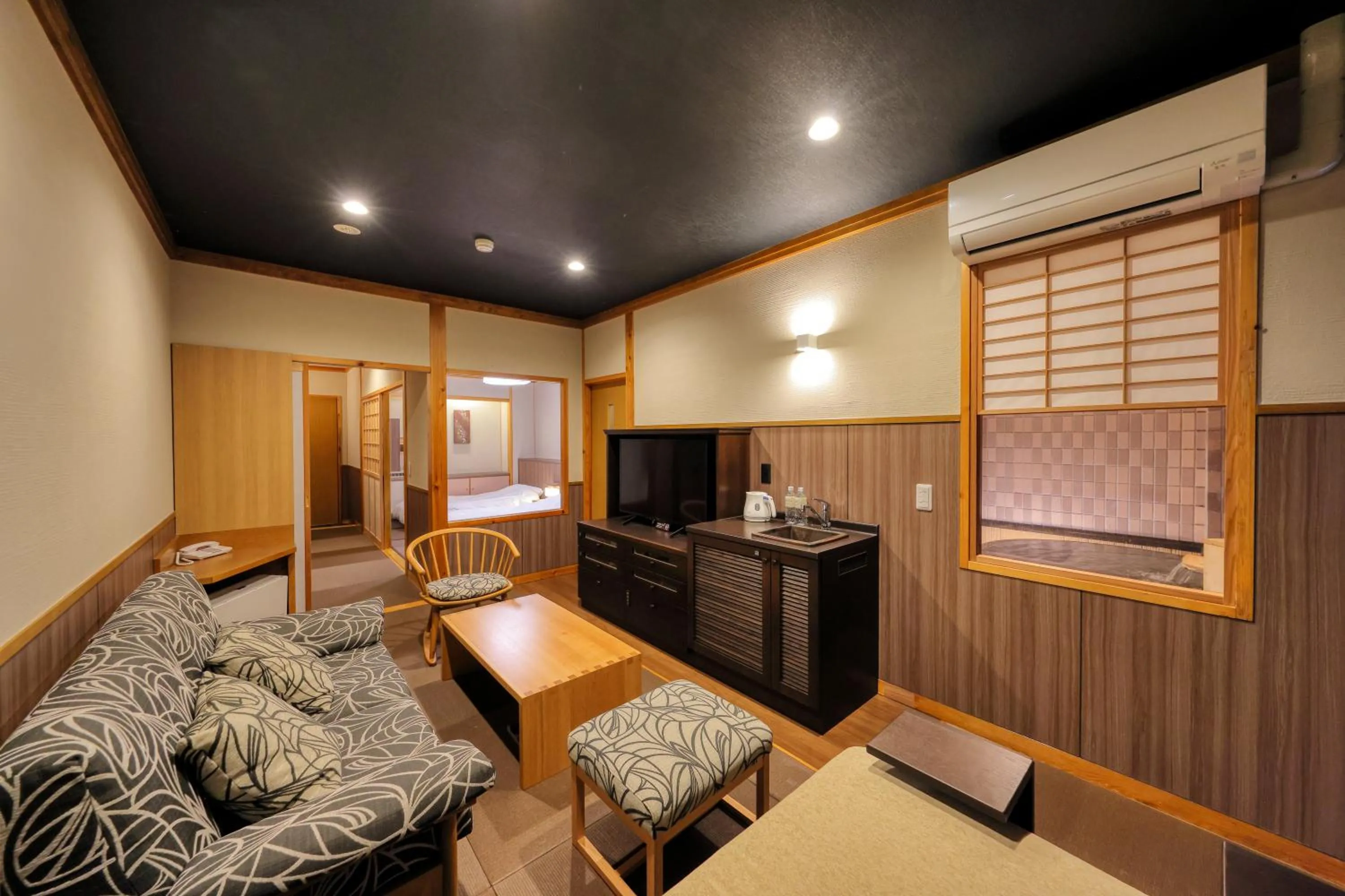 Living room in Miyama Ouan Kyoritsu Resort