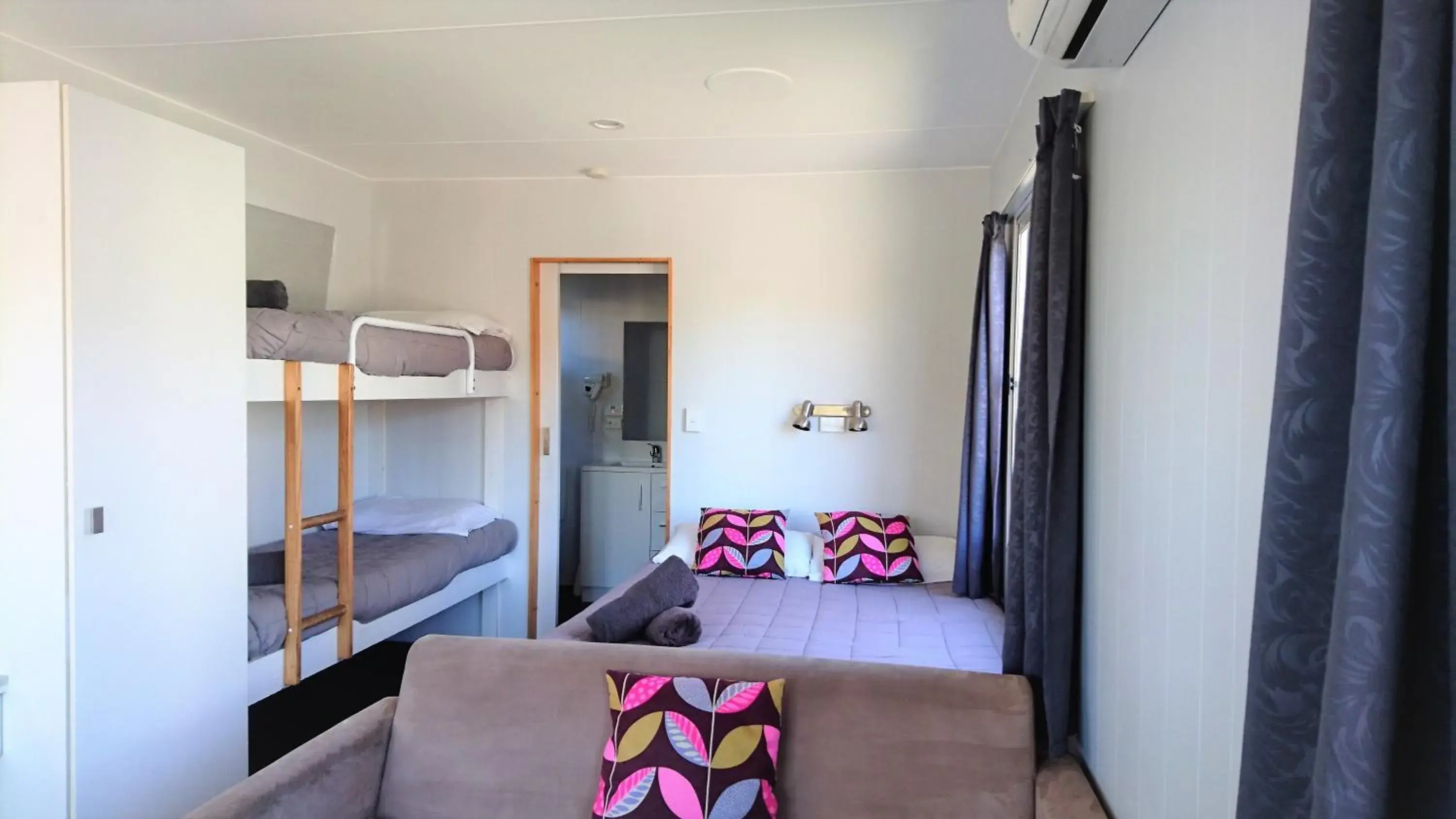 Living room, Bed in Taupo Debretts Spa Resort Living room, Bed in Taupo Debretts Spa Resort