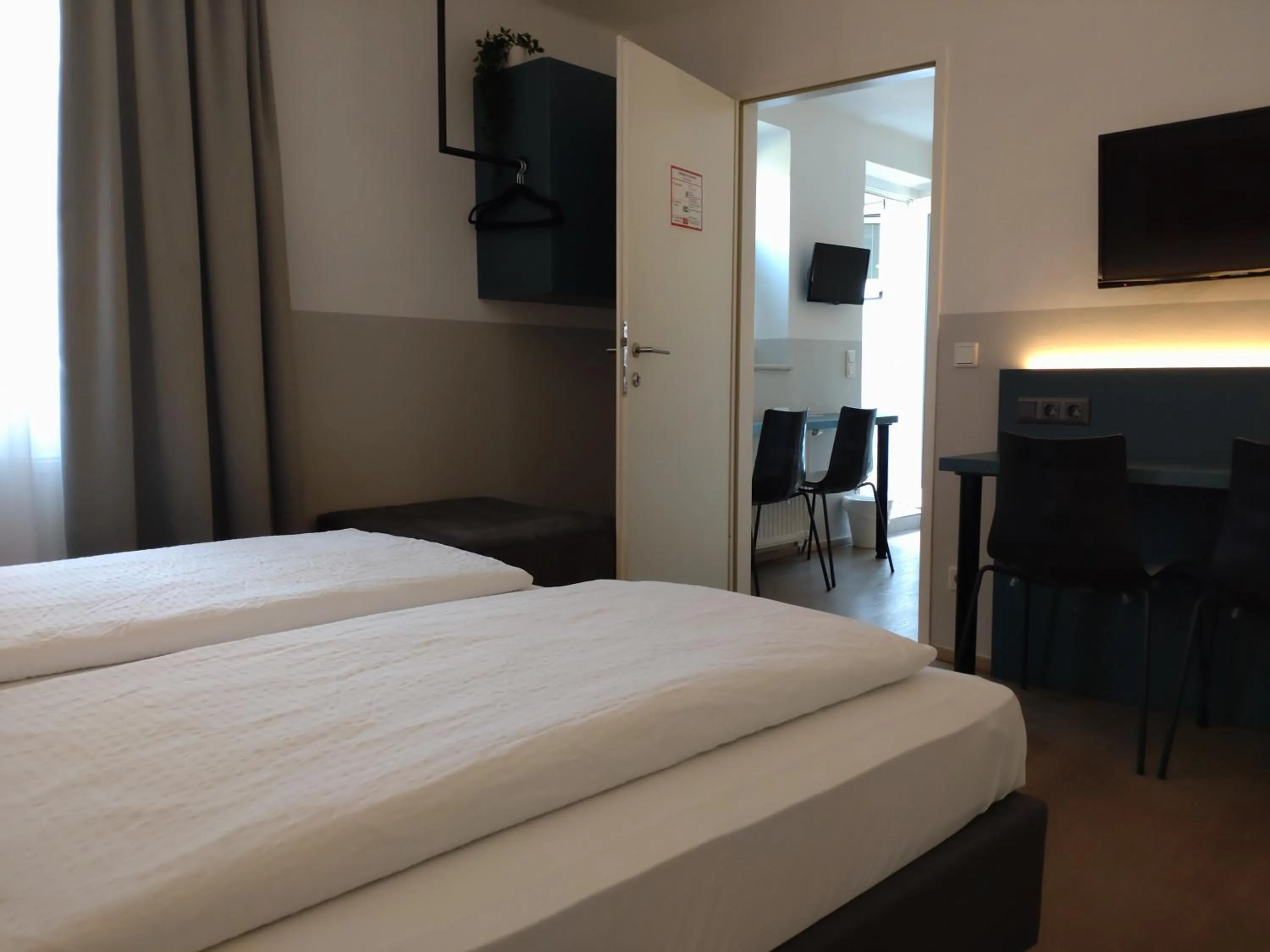 TV and multimedia, Bed in Pension Elisabeth - Rooms & Apartments