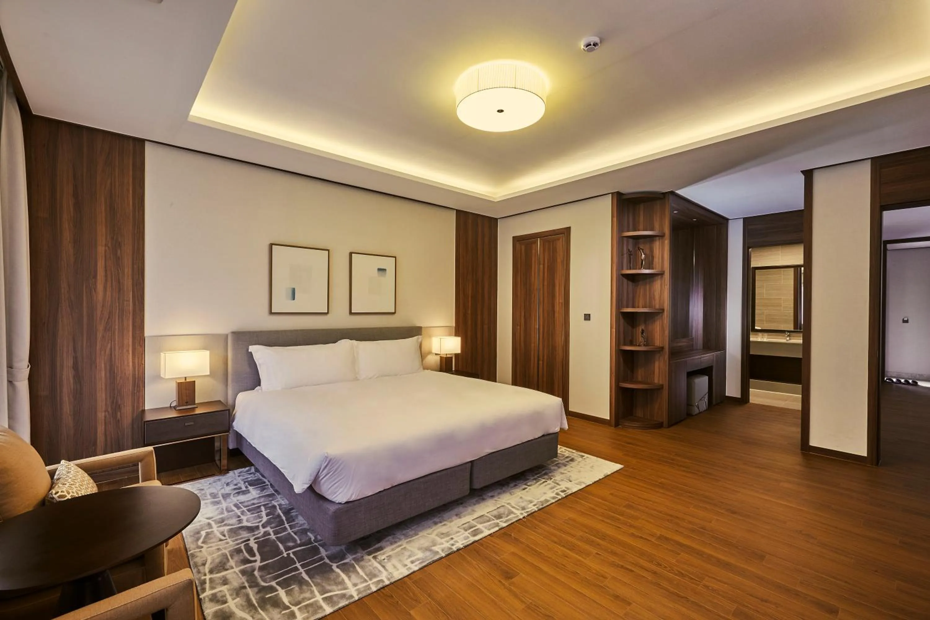 Bed in Camphortree Hotel and Resort