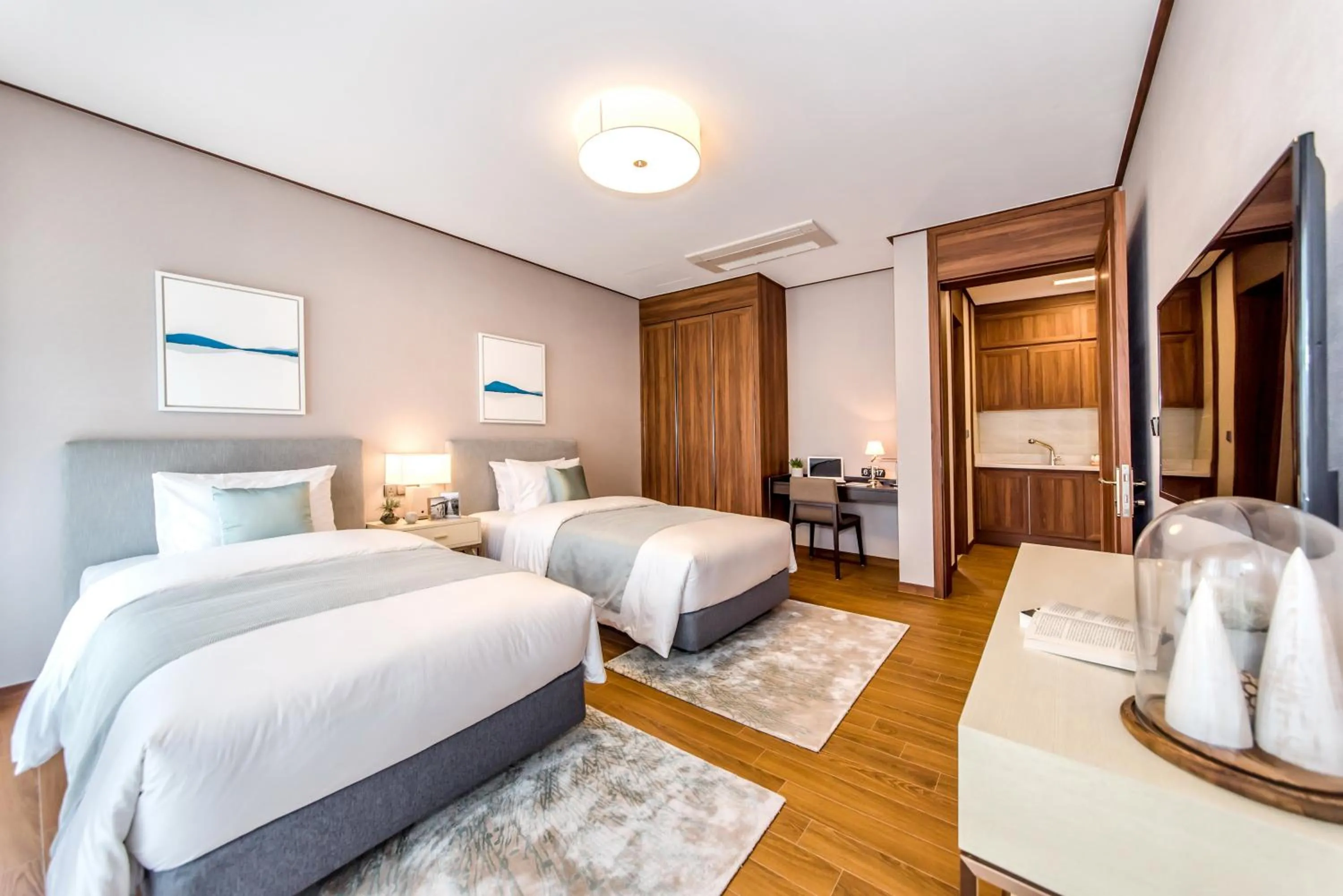 Bed in Camphortree Hotel and Resort