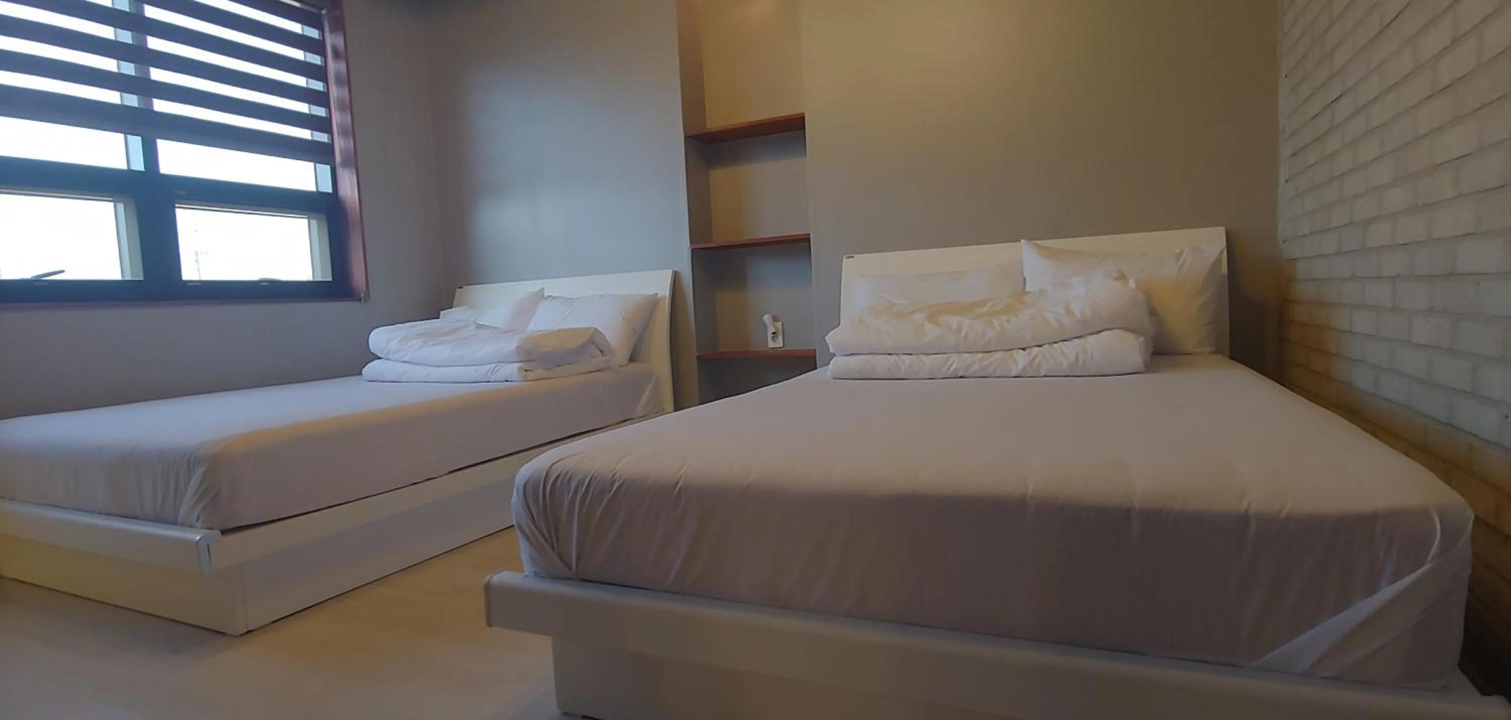 Bed in White Windmill Guesthouse