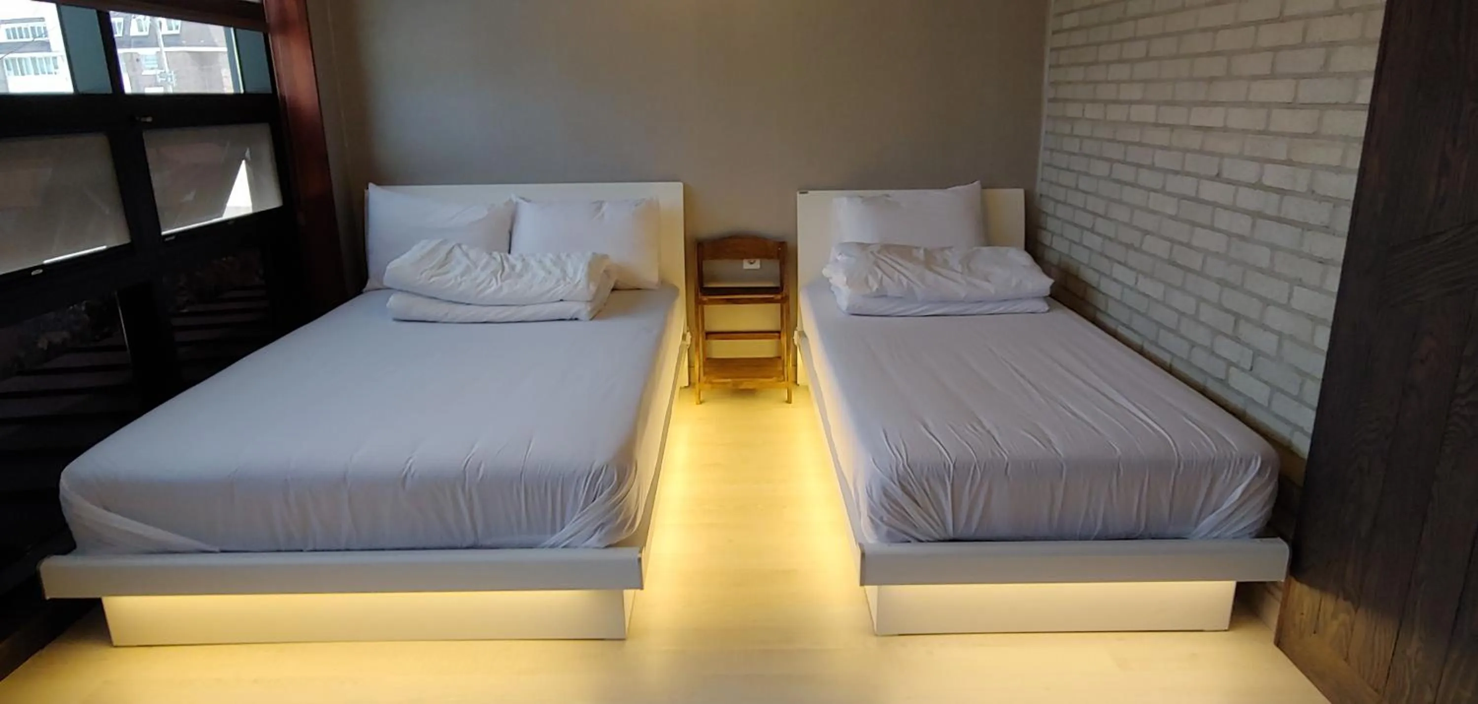 Bed in White Windmill Guesthouse