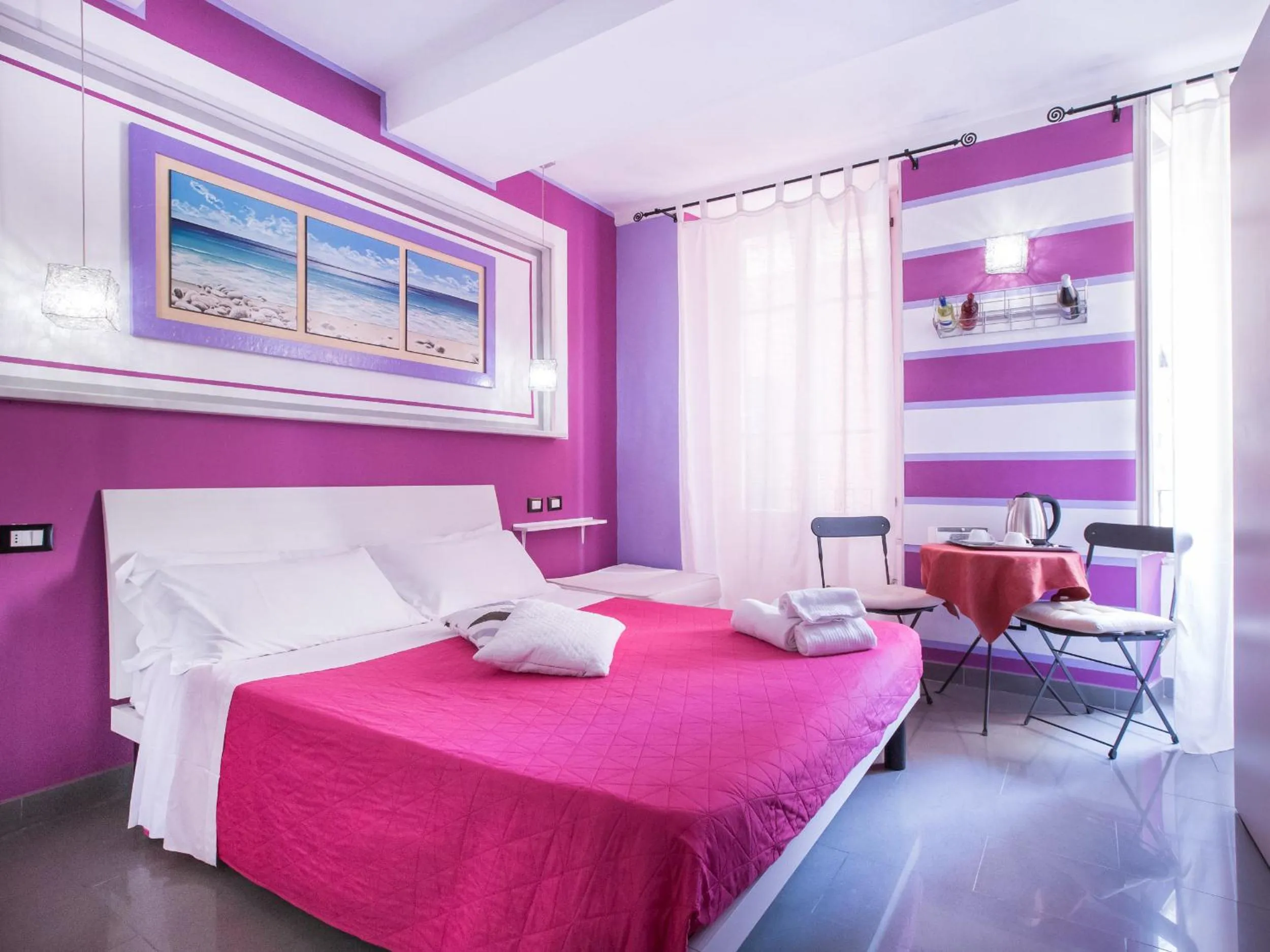 Bed in I Coralli rooms & apartments
