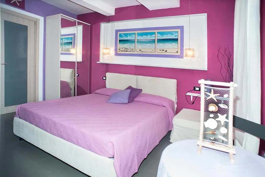 Bedroom, Bed in I Coralli rooms & apartments