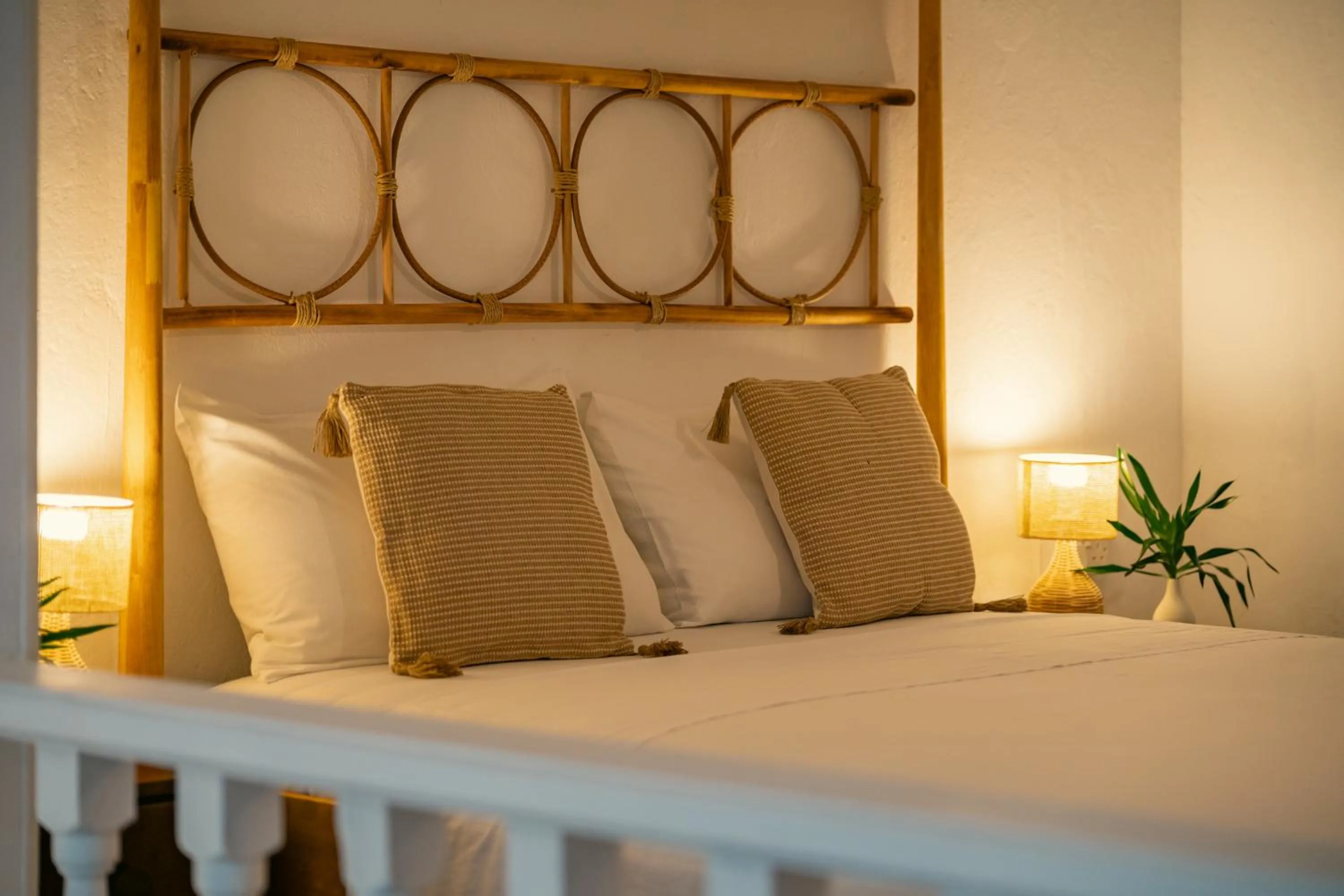 Bed in Beau Vallon Bungalows