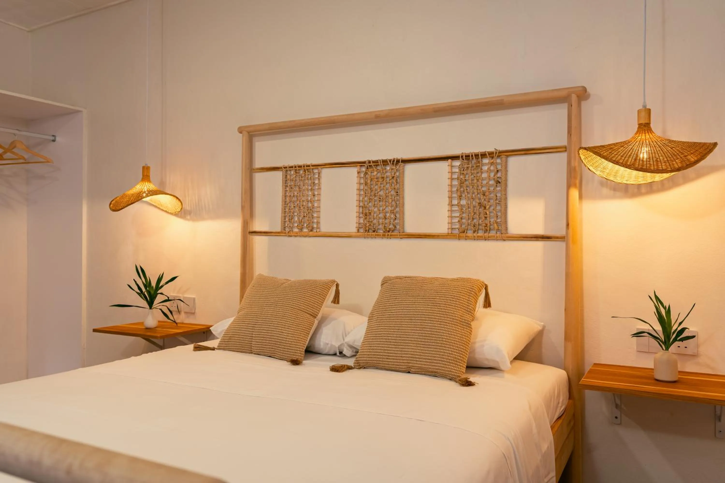 Bed in Beau Vallon Bungalows