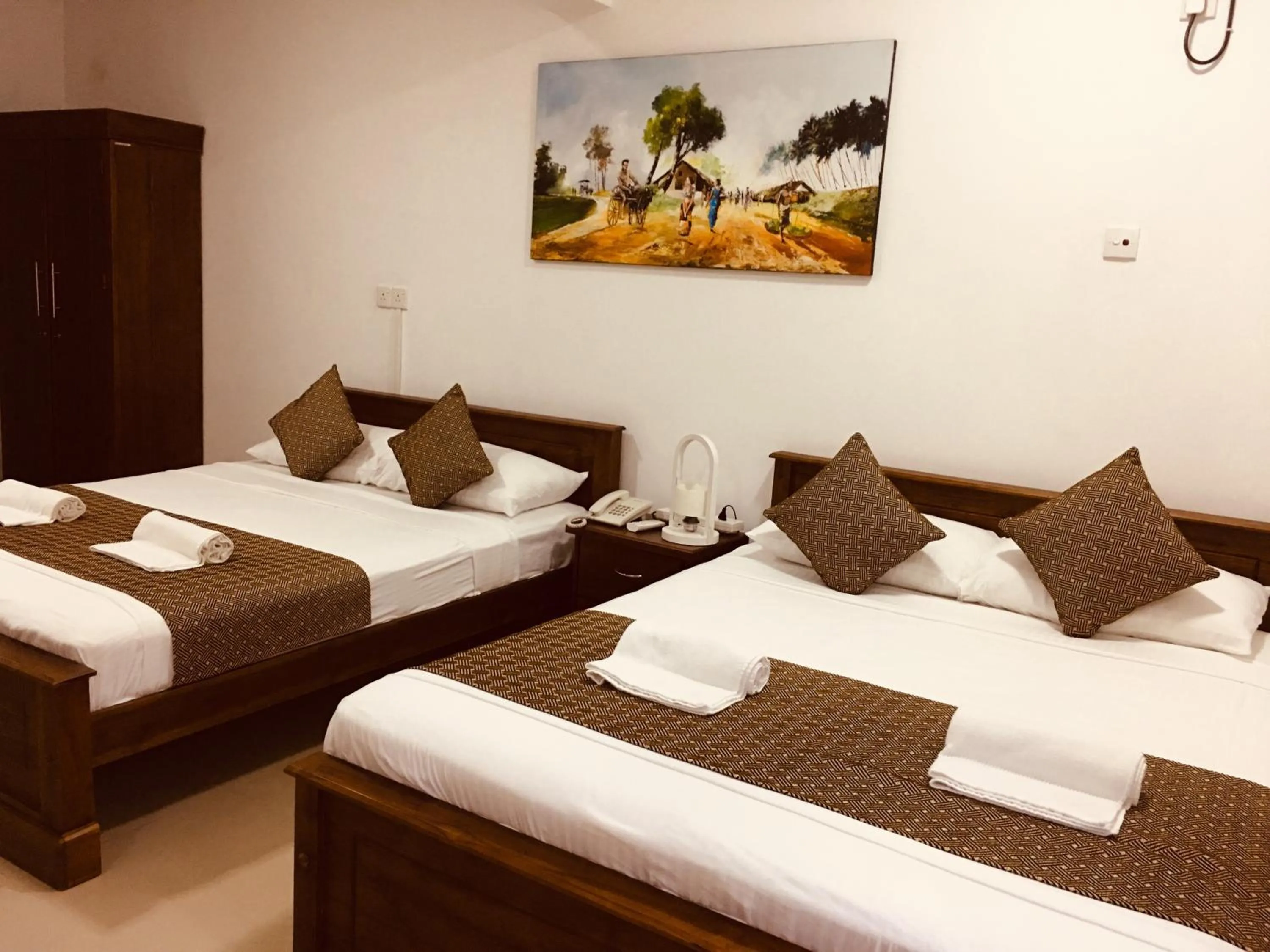 Bed in Sarvodaya Samma Vaasa Residence