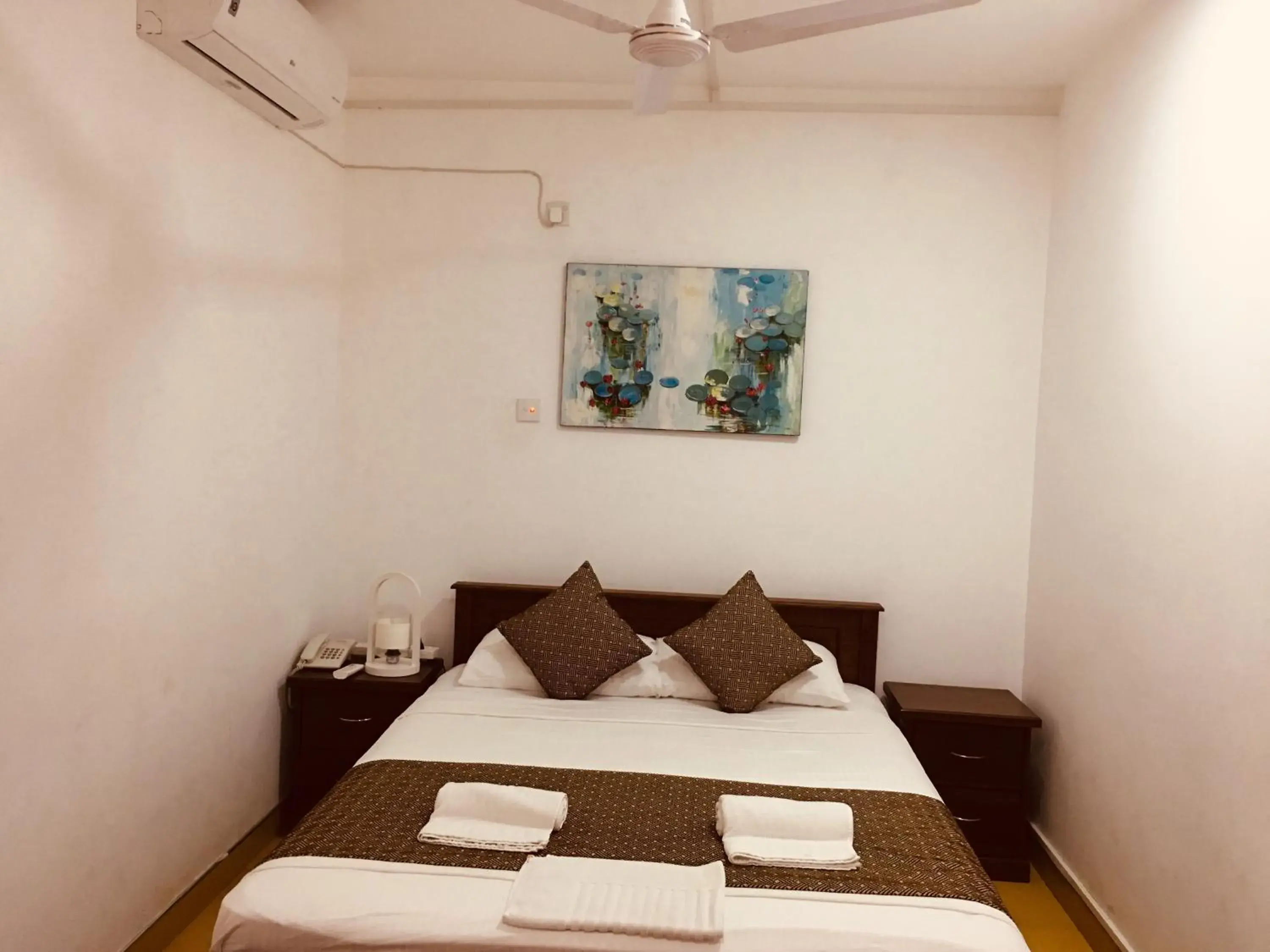 Bed in Sarvodaya Samma Vaasa Residence Bed in Sarvodaya Samma Vaasa Residence