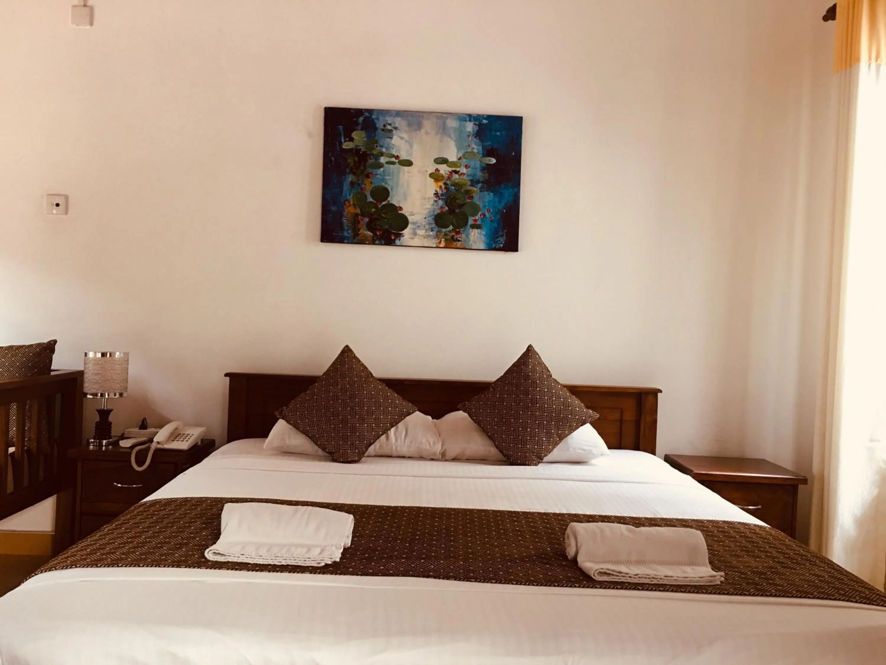 Bed in Sarvodaya Samma Vaasa Residence