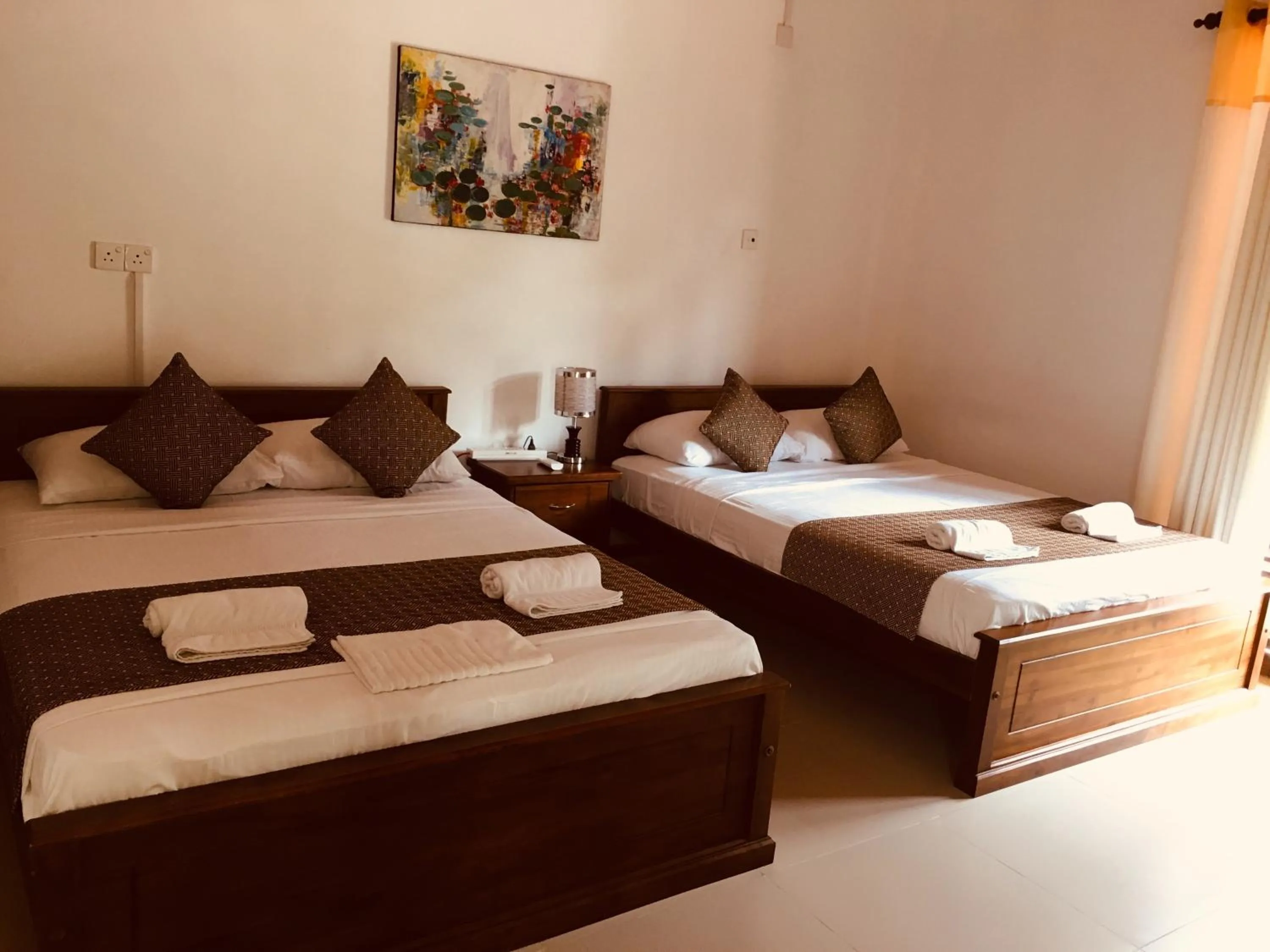 Bed in Sarvodaya Samma Vaasa Residence