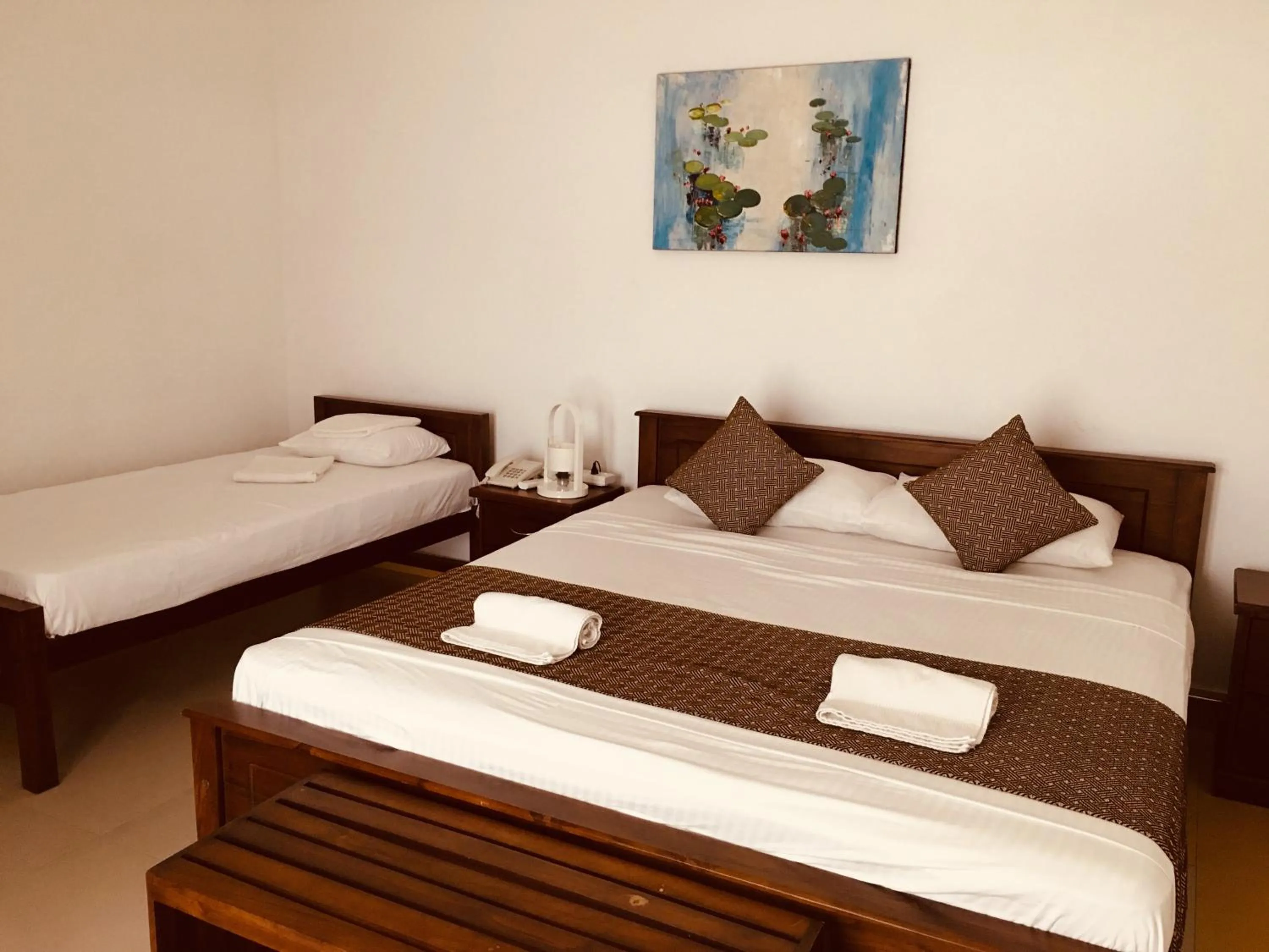 Bed in Sarvodaya Samma Vaasa Residence