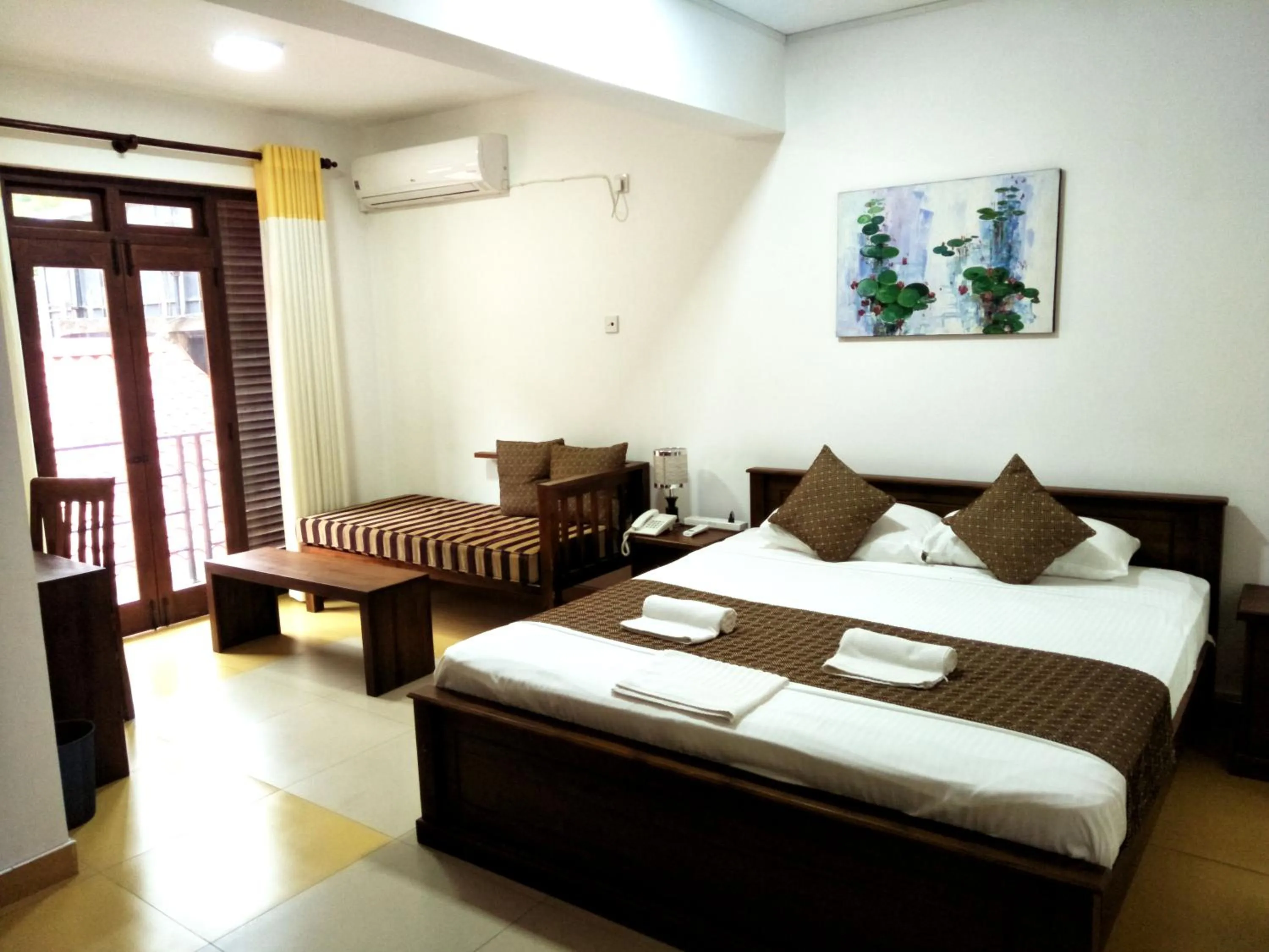 Bed in Sarvodaya Samma Vaasa Residence