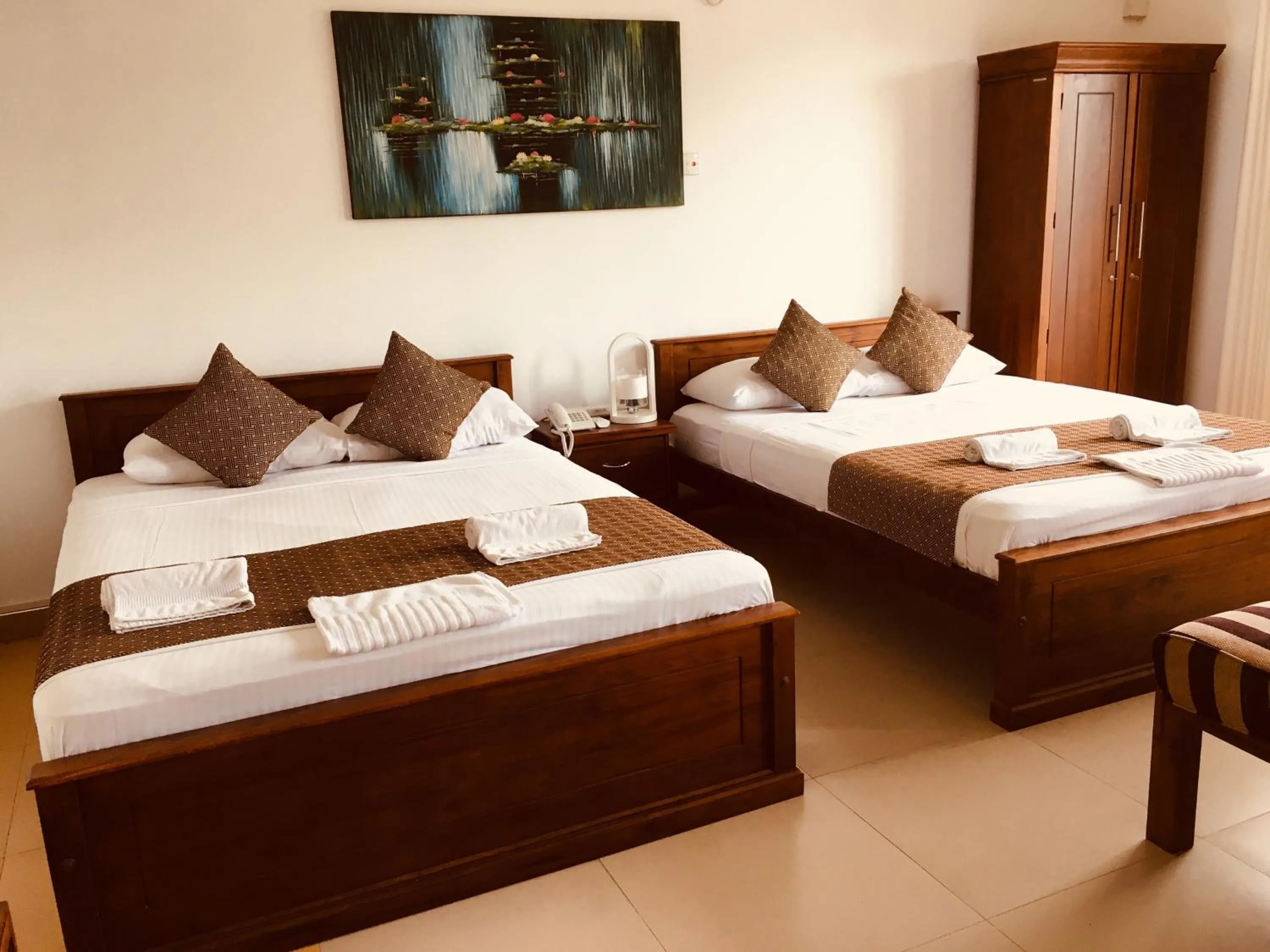 Bed in Sarvodaya Samma Vaasa Residence