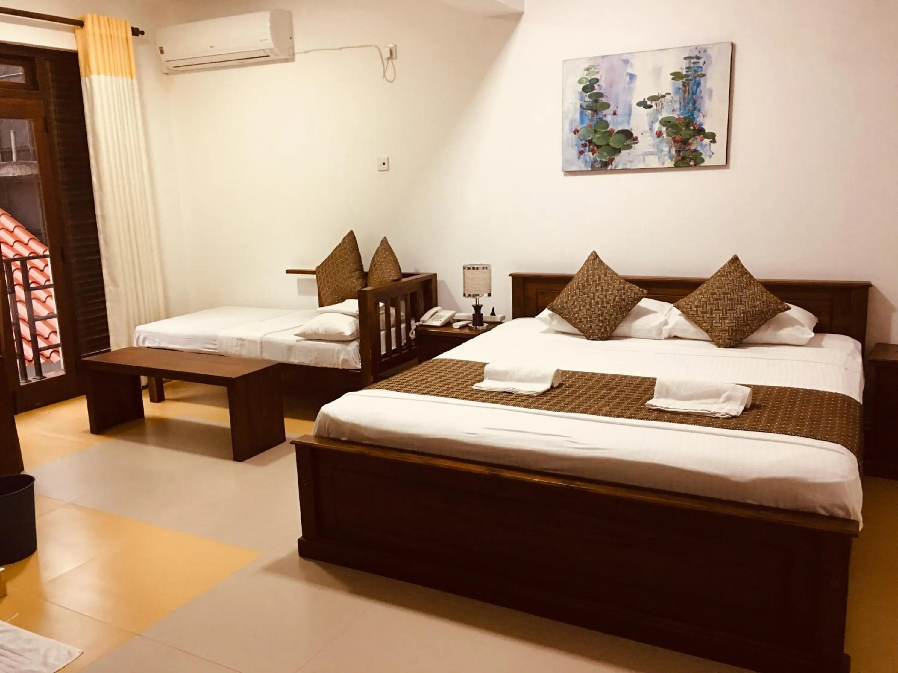 Bed in Sarvodaya Samma Vaasa Residence