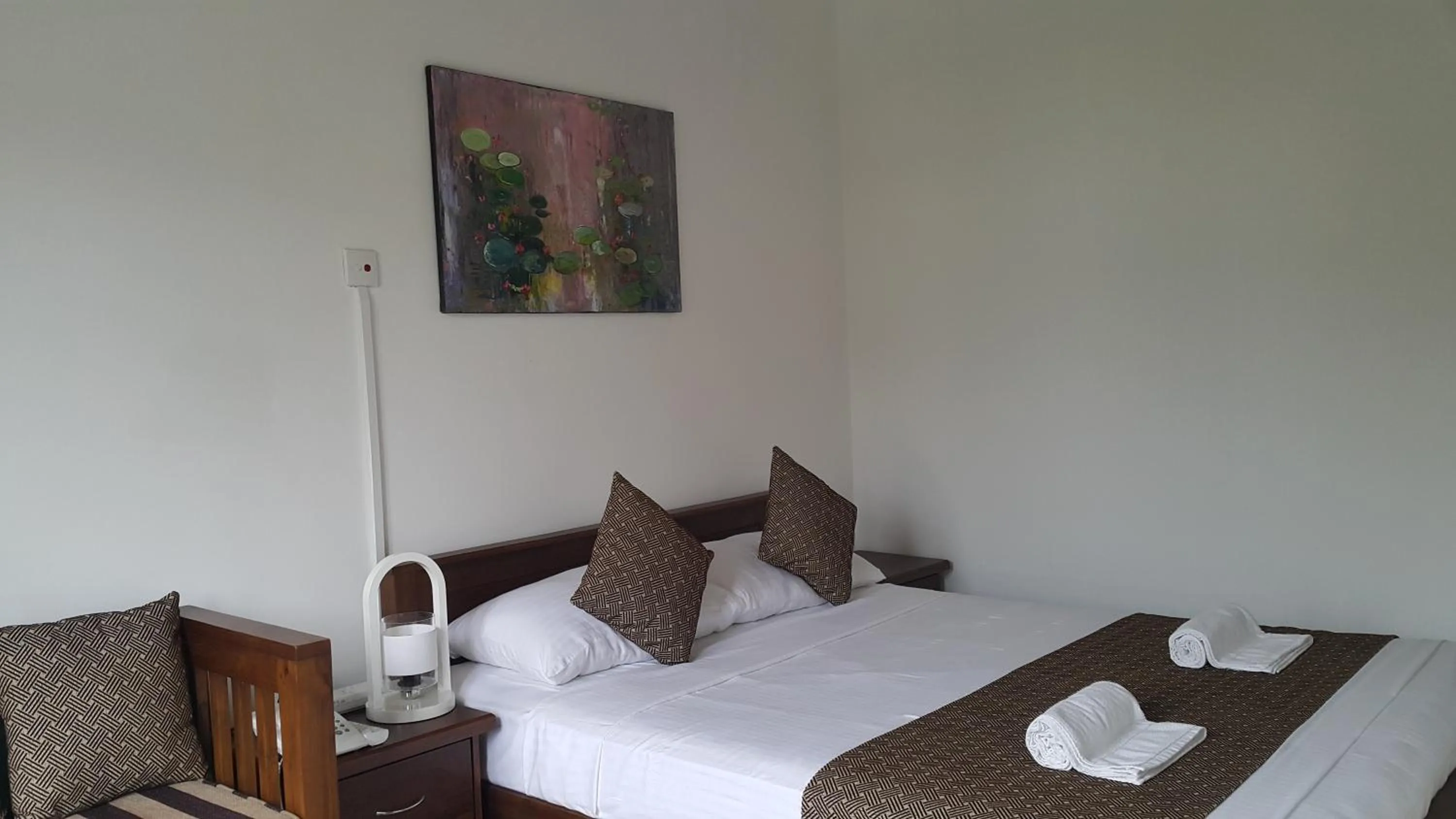 Bed in Sarvodaya Samma Vaasa Residence