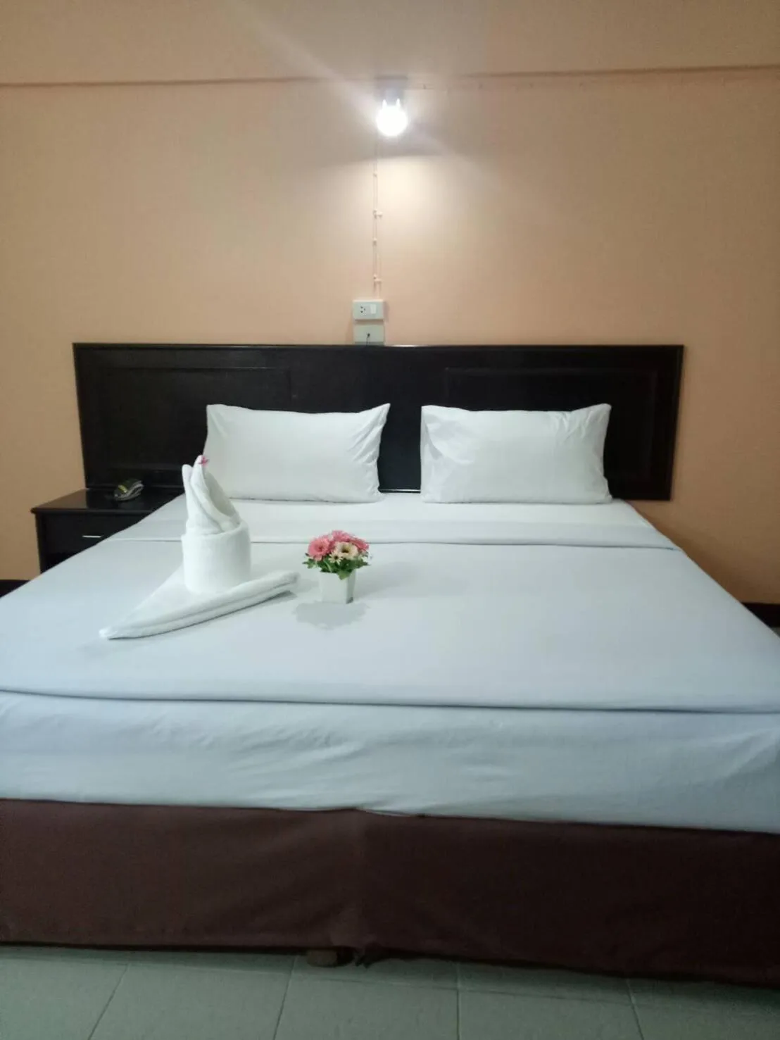 Bed in Centerpoint Hotel