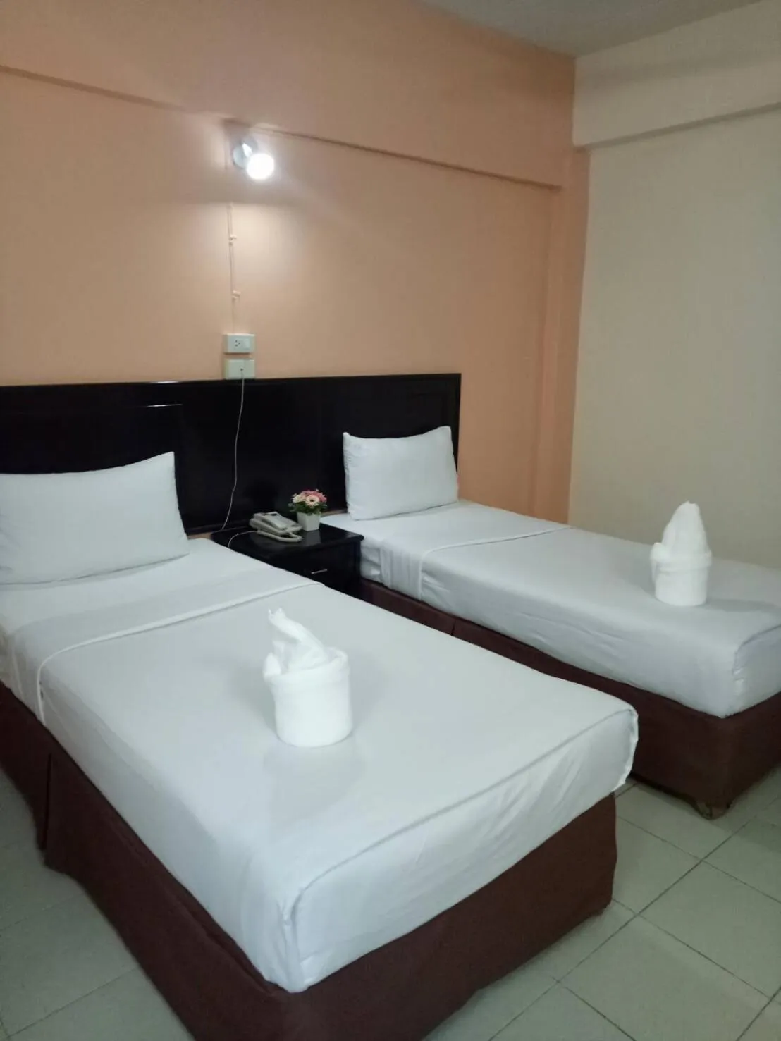 Bed in Centerpoint Hotel