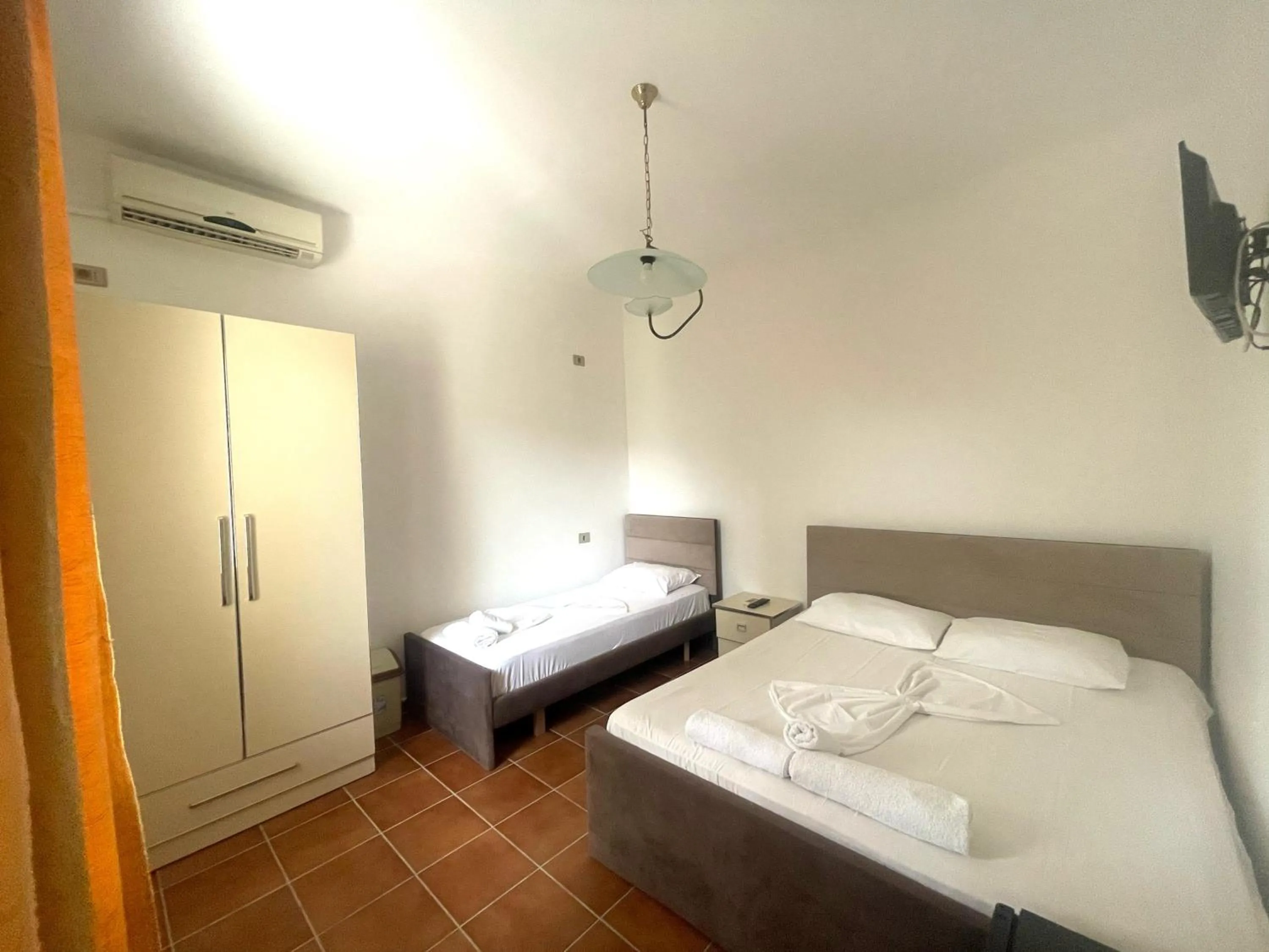 Bed in Hotel Athina