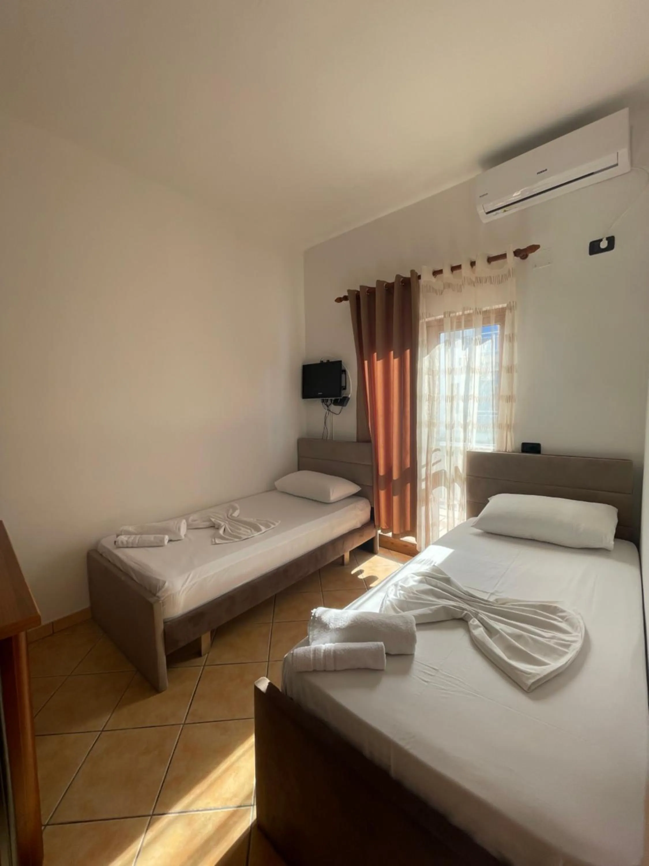 Bed in Hotel Athina