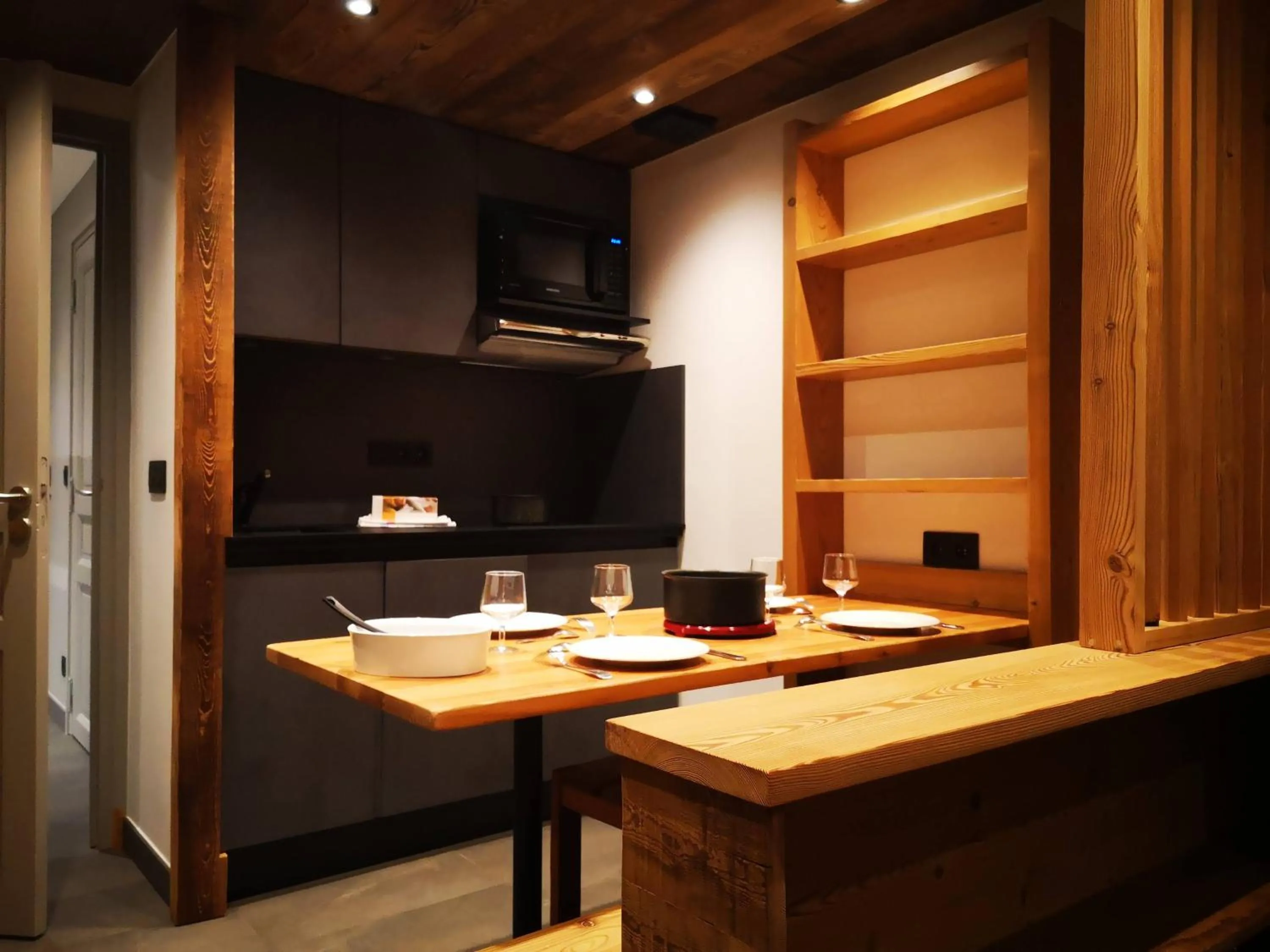 Kitchen or kitchenette in Alliey & Spa Piscine Appart-hôtel Serre chevalier