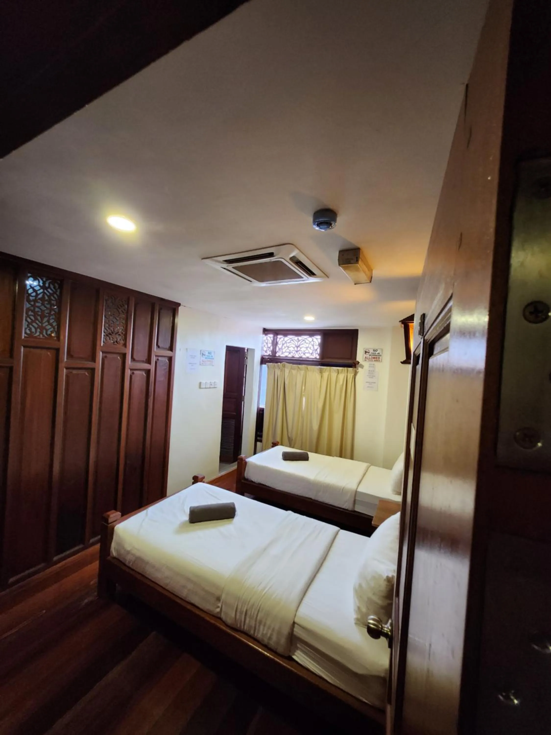 Bed in Uptown Eco Hotel