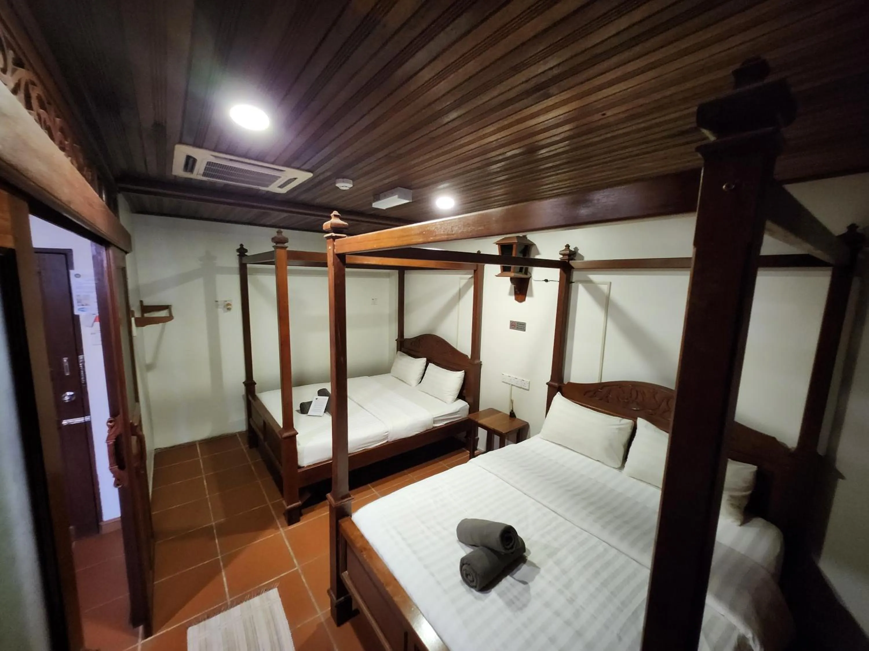 Bed in Uptown Eco Hotel