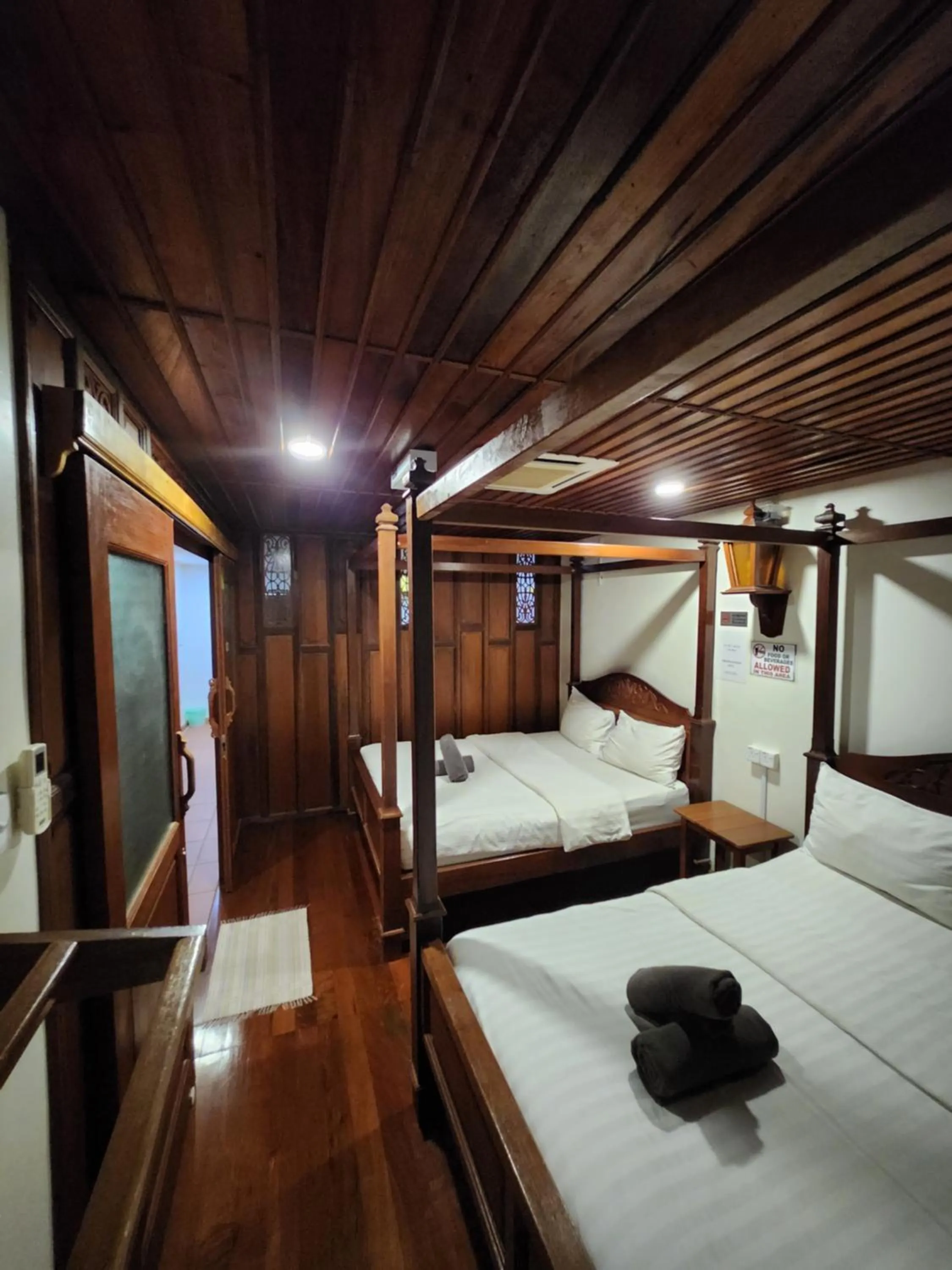 Bed in Uptown Eco Hotel