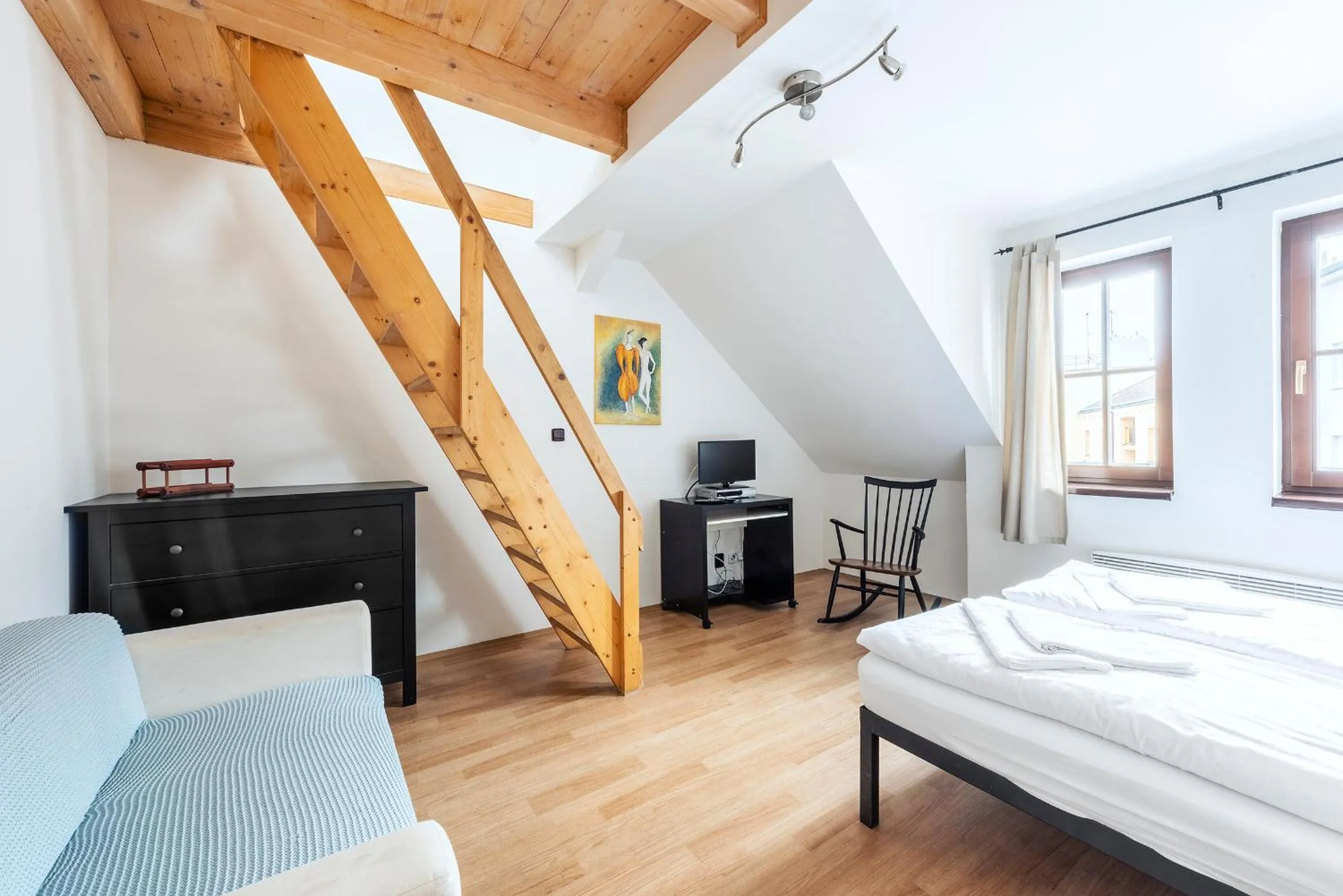 Seating area, Bed in Family Apartments Praha 6