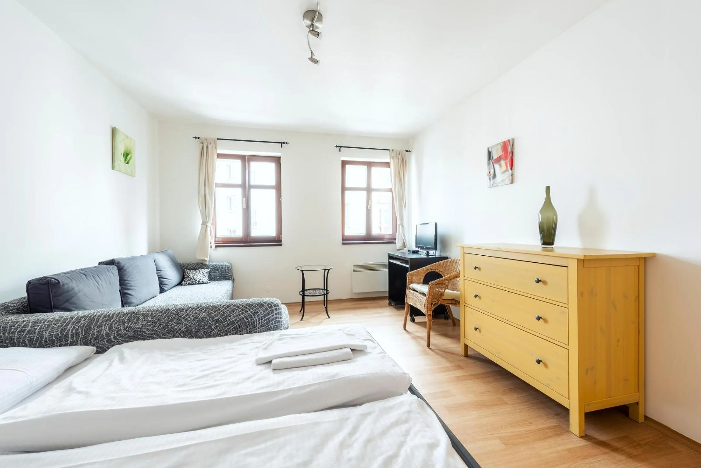 Living room, Bed in Family Apartments Praha 6