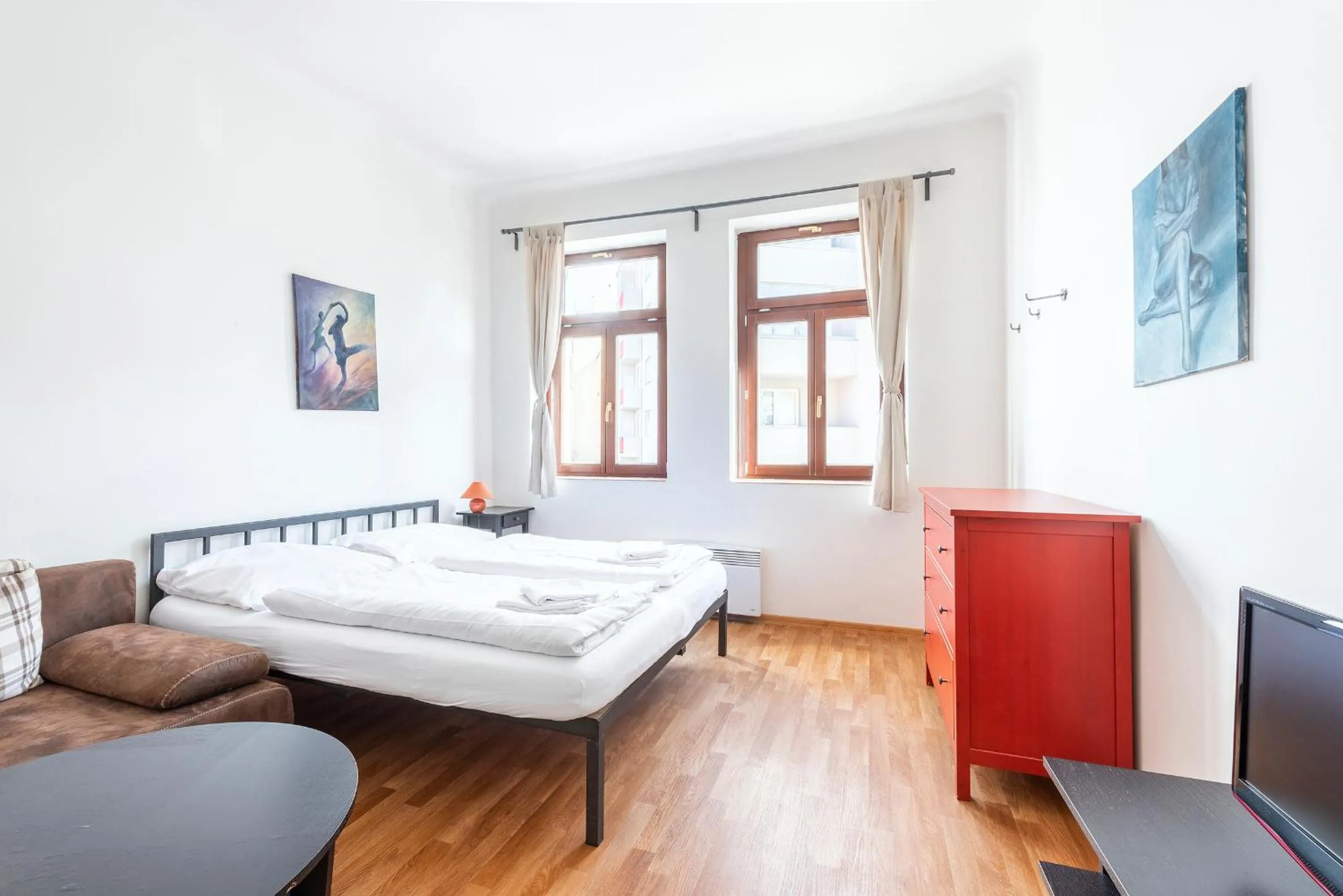 Living room, Bed in Family Apartments Praha 6