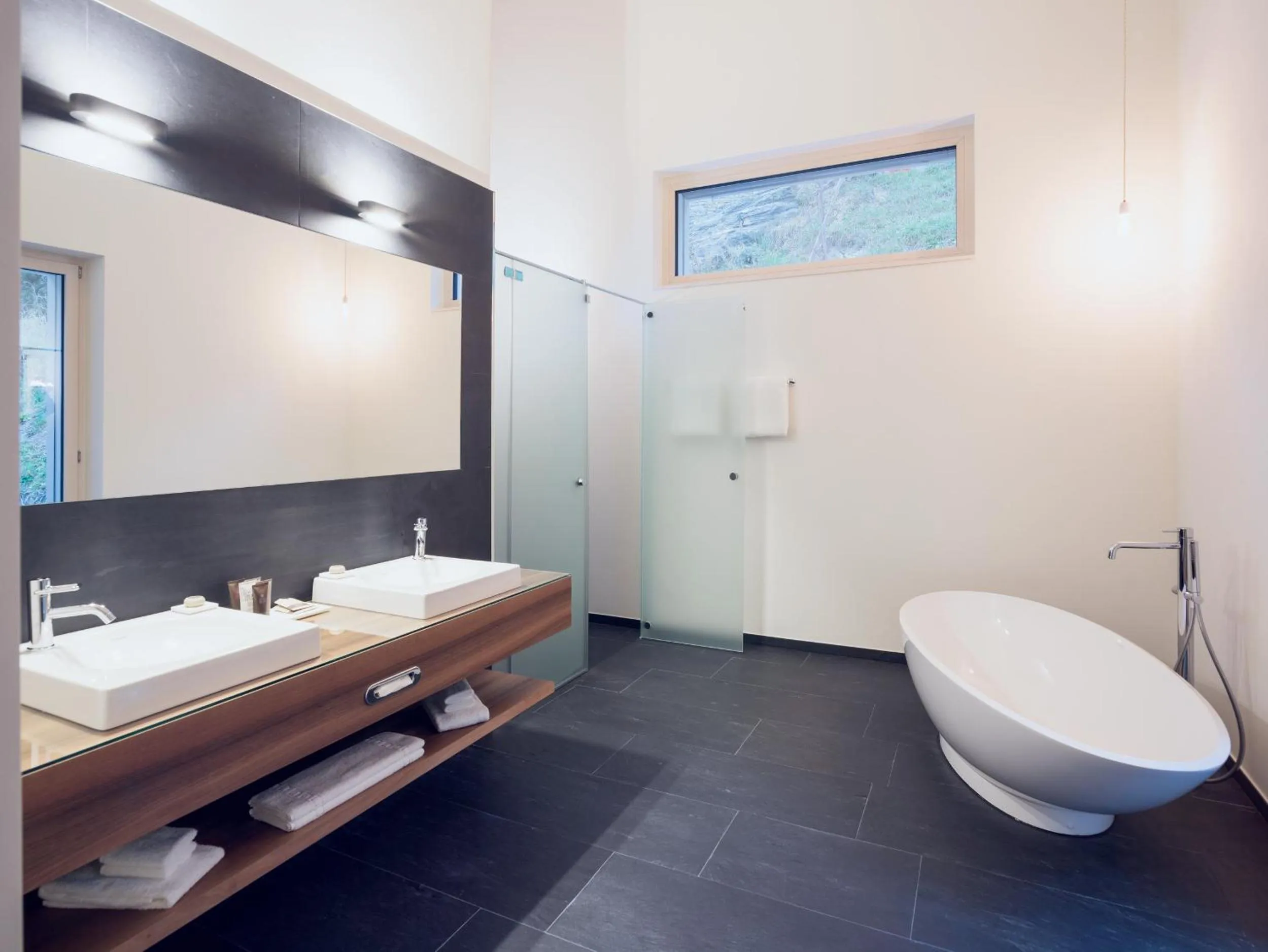 Bathroom in OVERLOOK Lodge by CERVO Zermatt