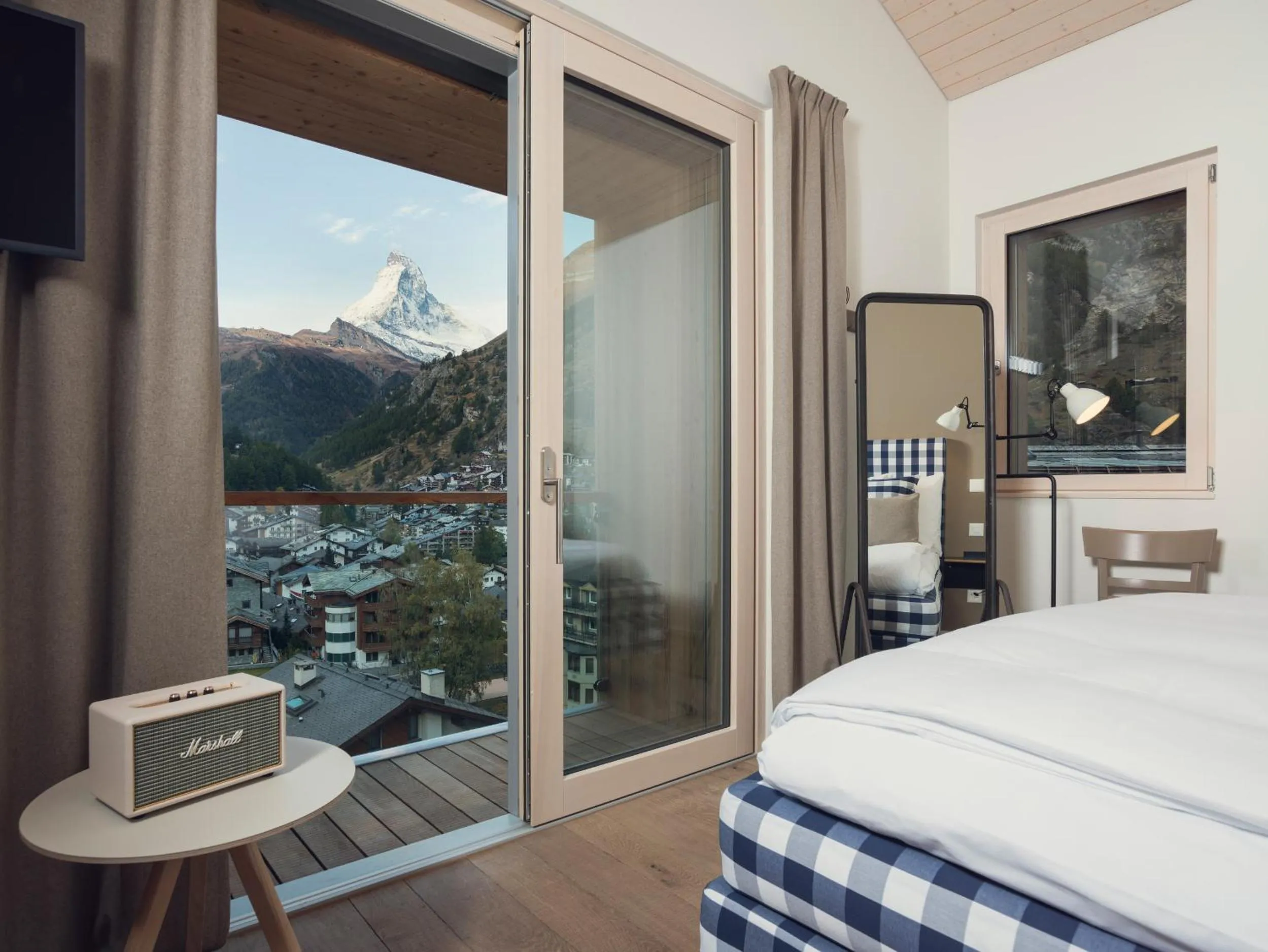 Bed in OVERLOOK Lodge by CERVO Zermatt